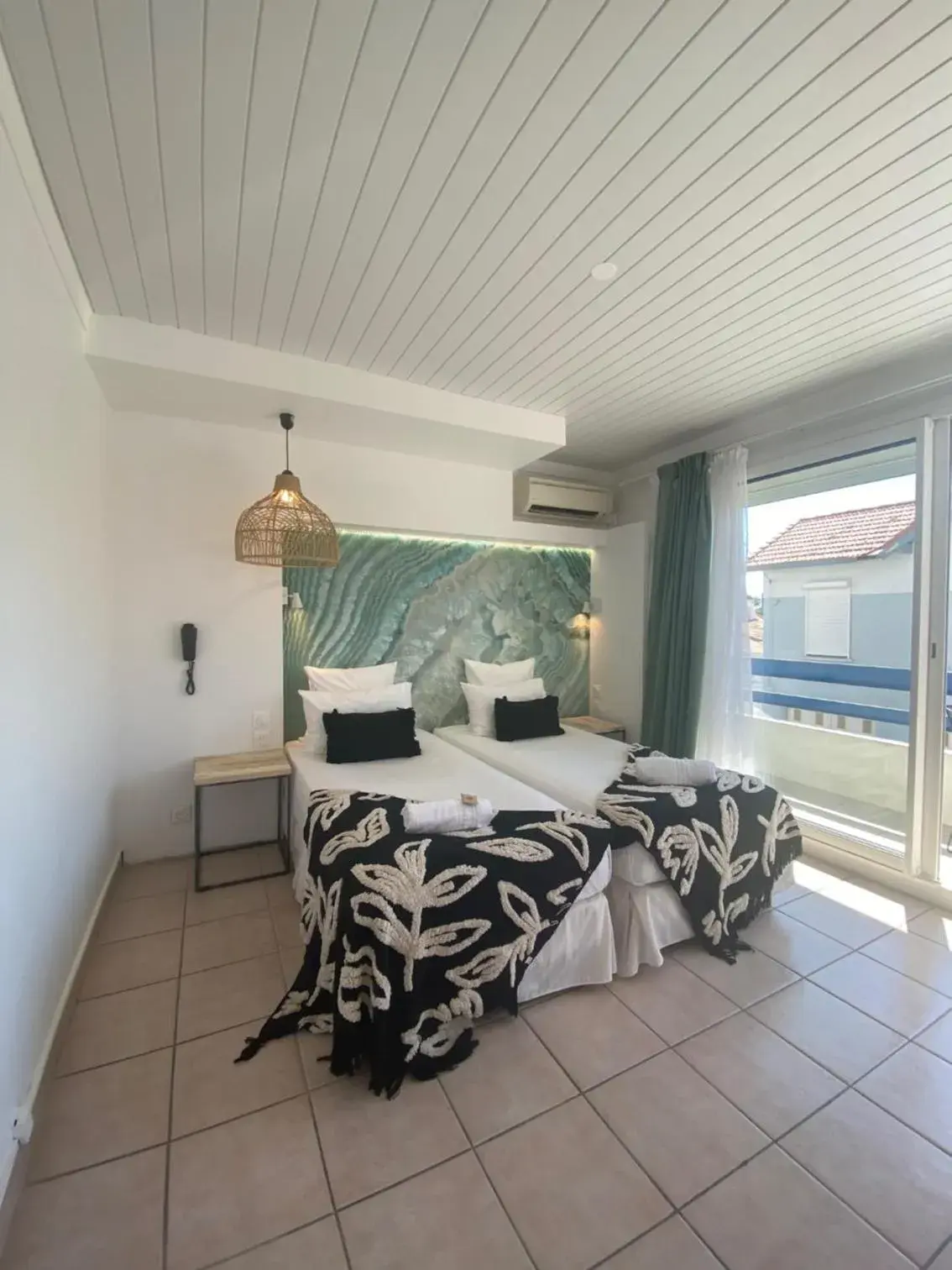 Twin Room with Terrace in Hôtel Les Sables - Urban Style - by Logis Hotels Twin Room with Terrace in Hôtel Les Sables - Urban Style - by Logis Hotels