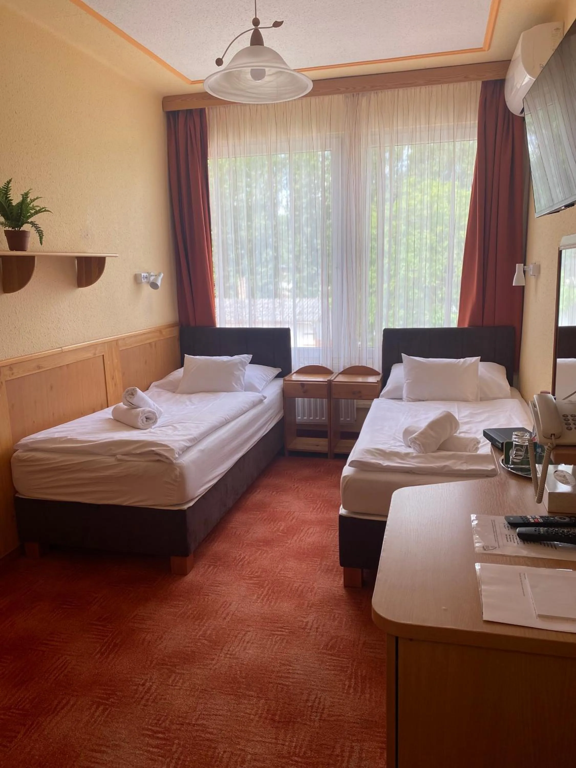 Bed in Nereus Park Hotel
