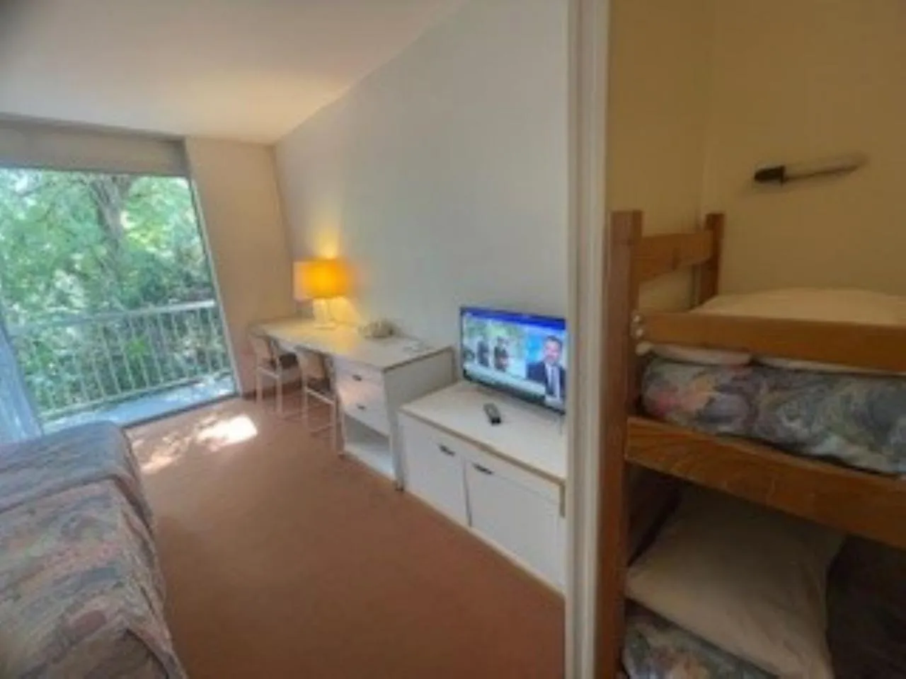 Balcony/Terrace, Bed in Hôtel Restaurant Pavillon Carina