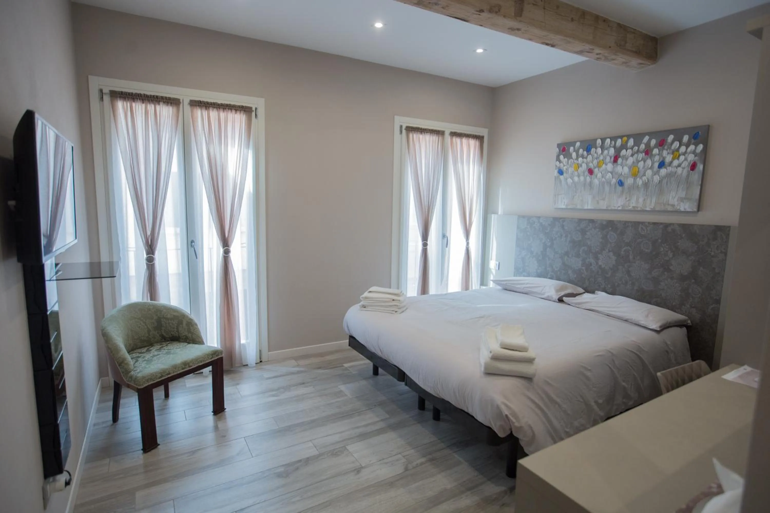 Bed in Lanterna Room&Breakfast