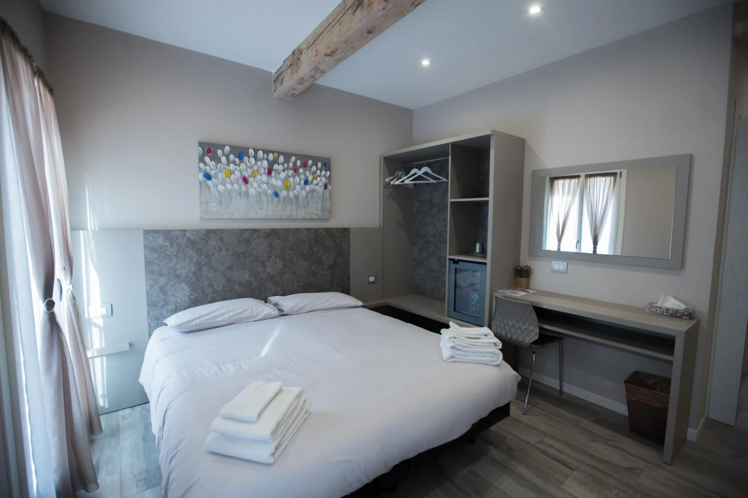 Bed in Lanterna Room&Breakfast