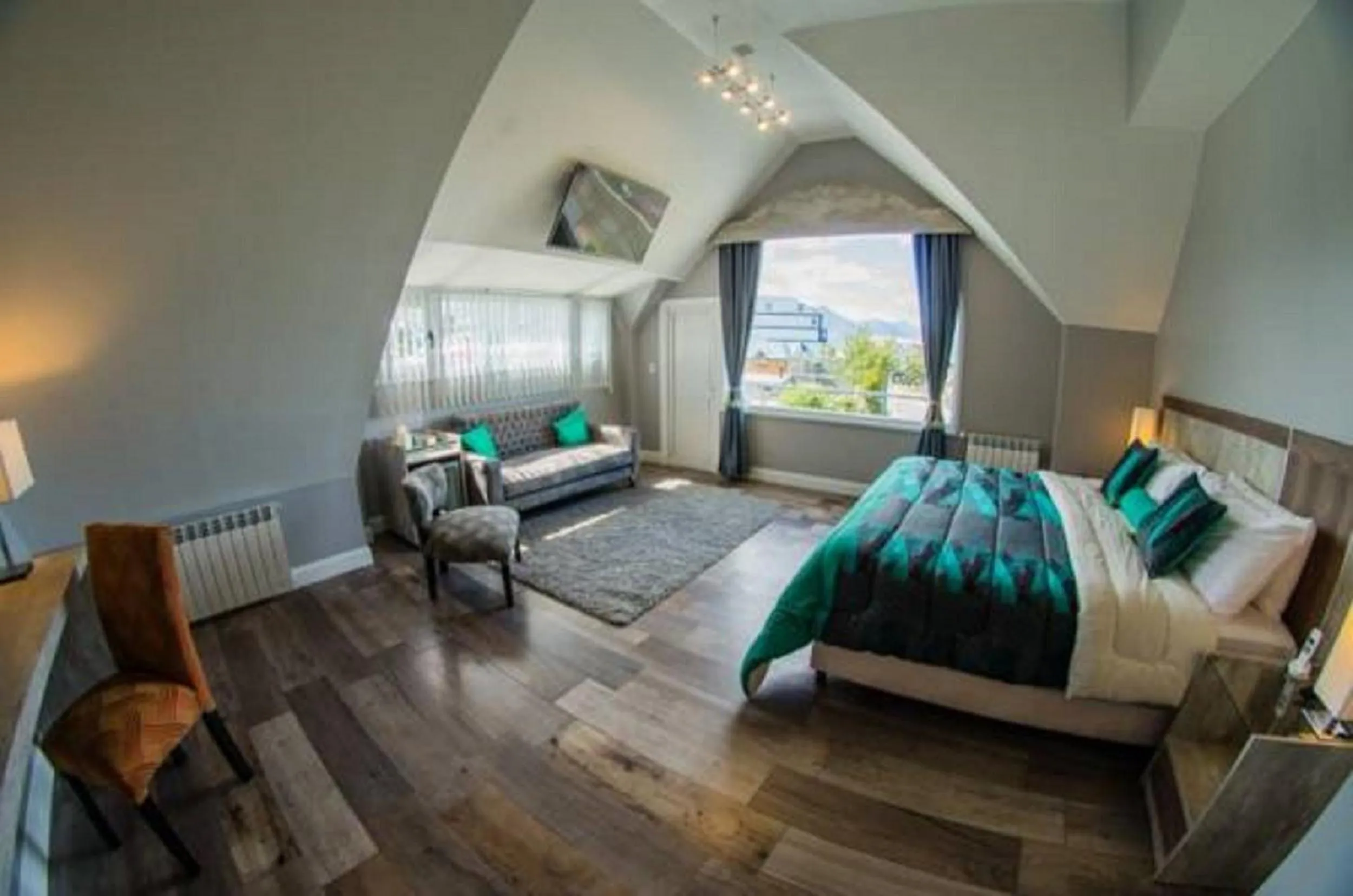 Living room, Bed in Hosteria y Restaurante America