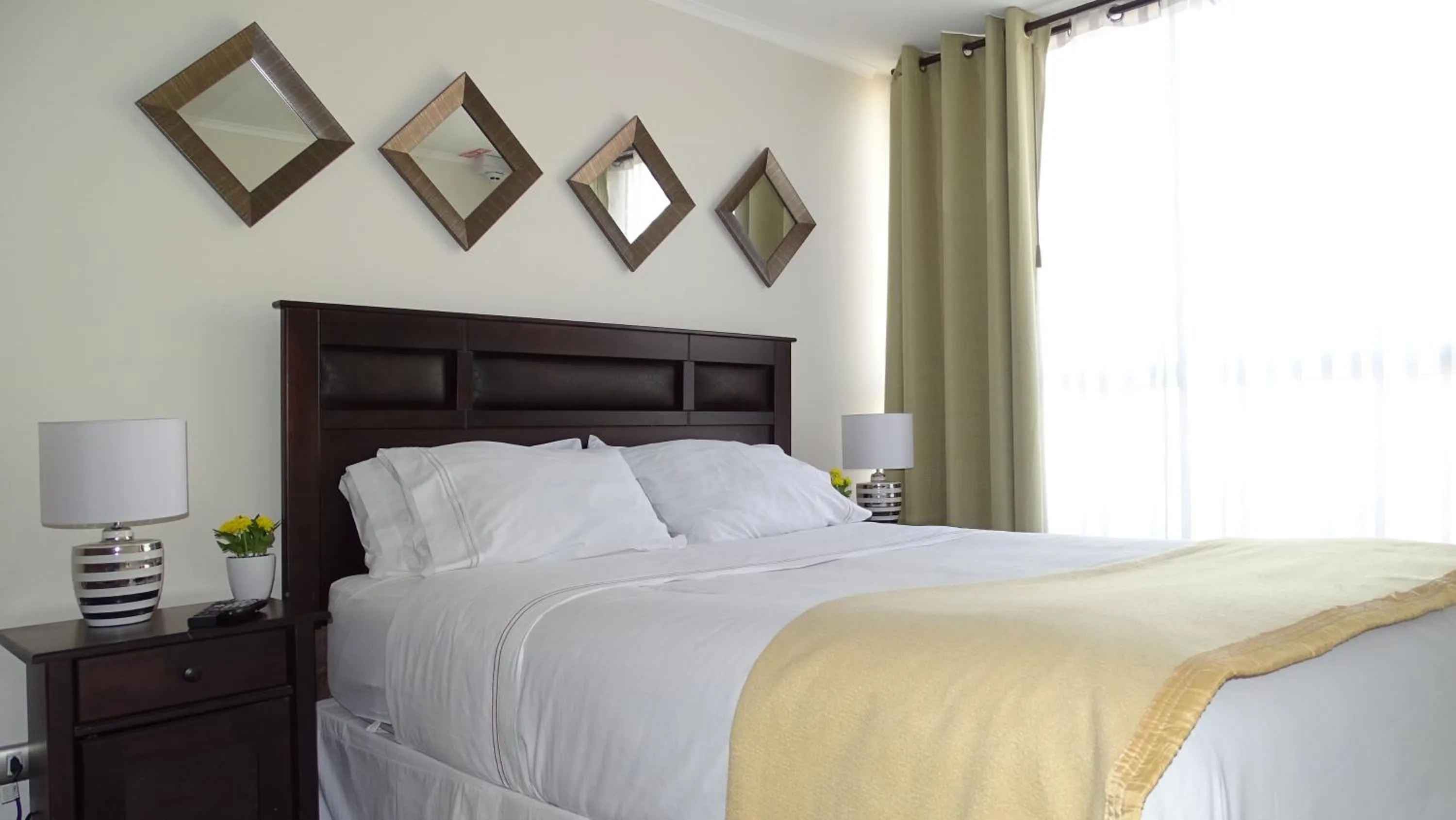 Bed in Moneda Express Apart