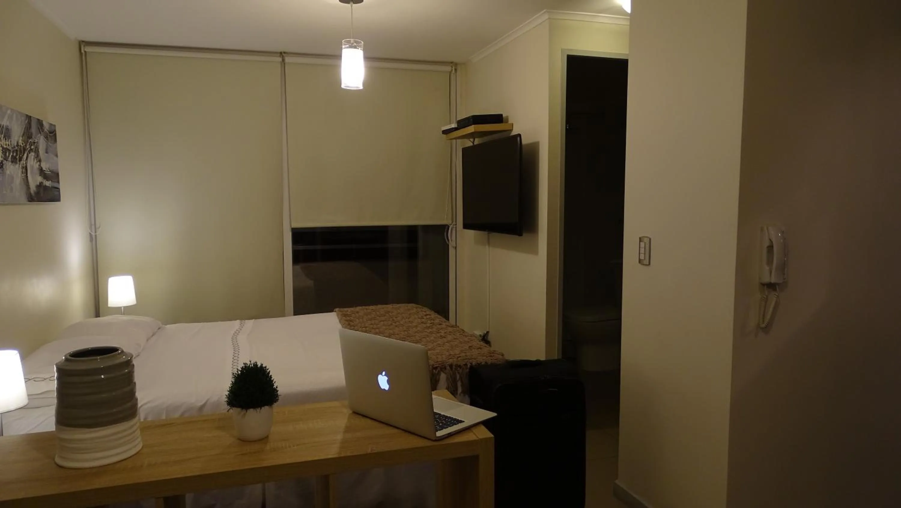 Bed in Moneda Express Apart