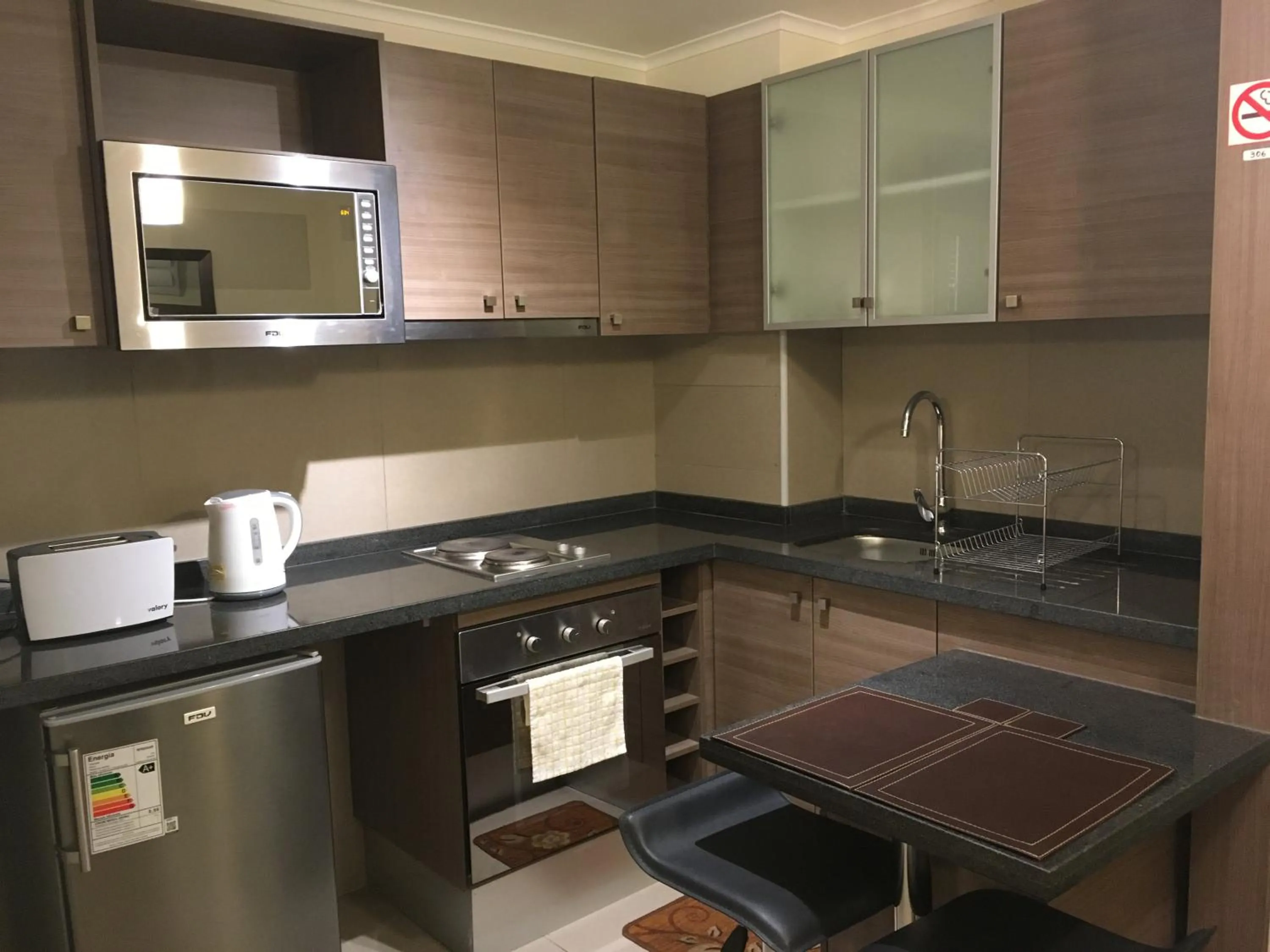 Kitchen or kitchenette in Moneda Express Apart