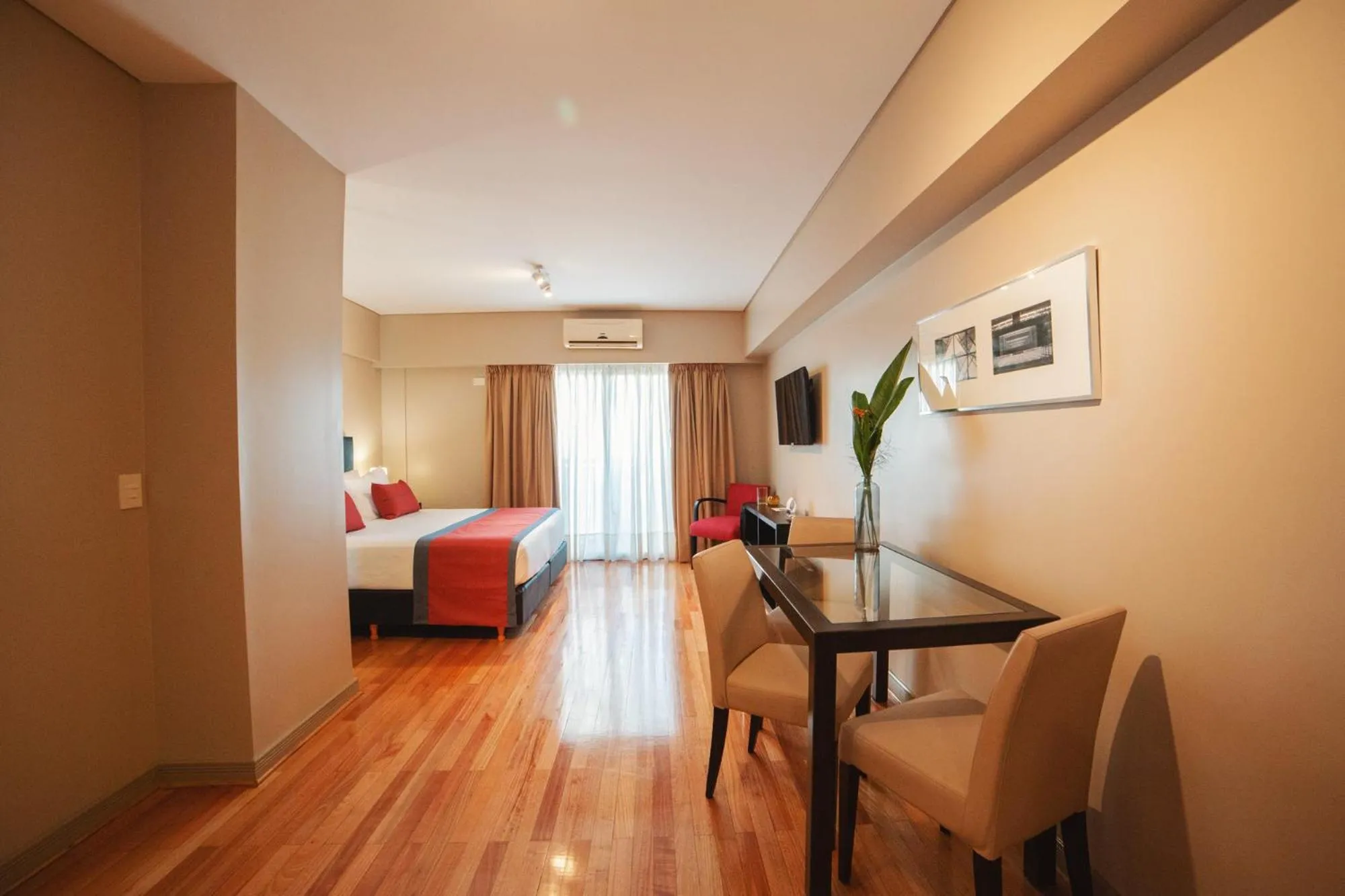 Living room, Bed in ARC Callao Studios & Suites