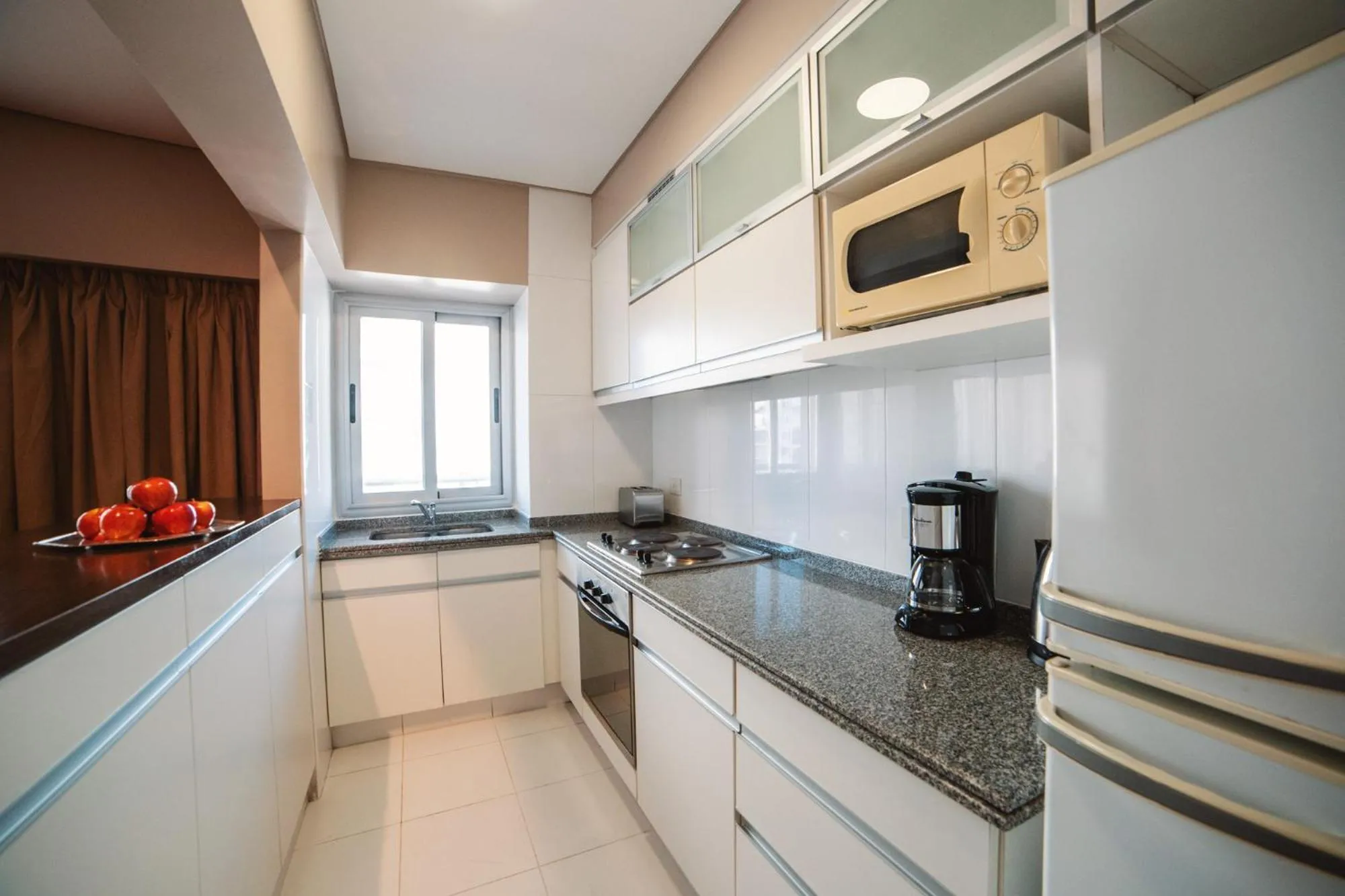 Kitchen or kitchenette in ARC Callao Studios & Suites