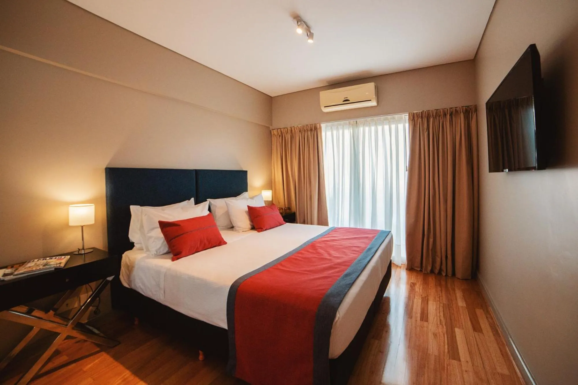 Bed in ARC Callao Studios & Suites