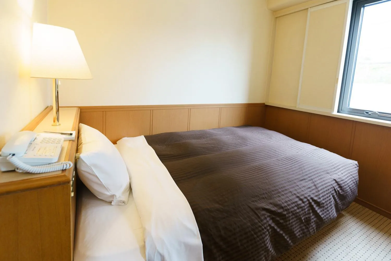 Bed in Kyoto Horikawa Inn