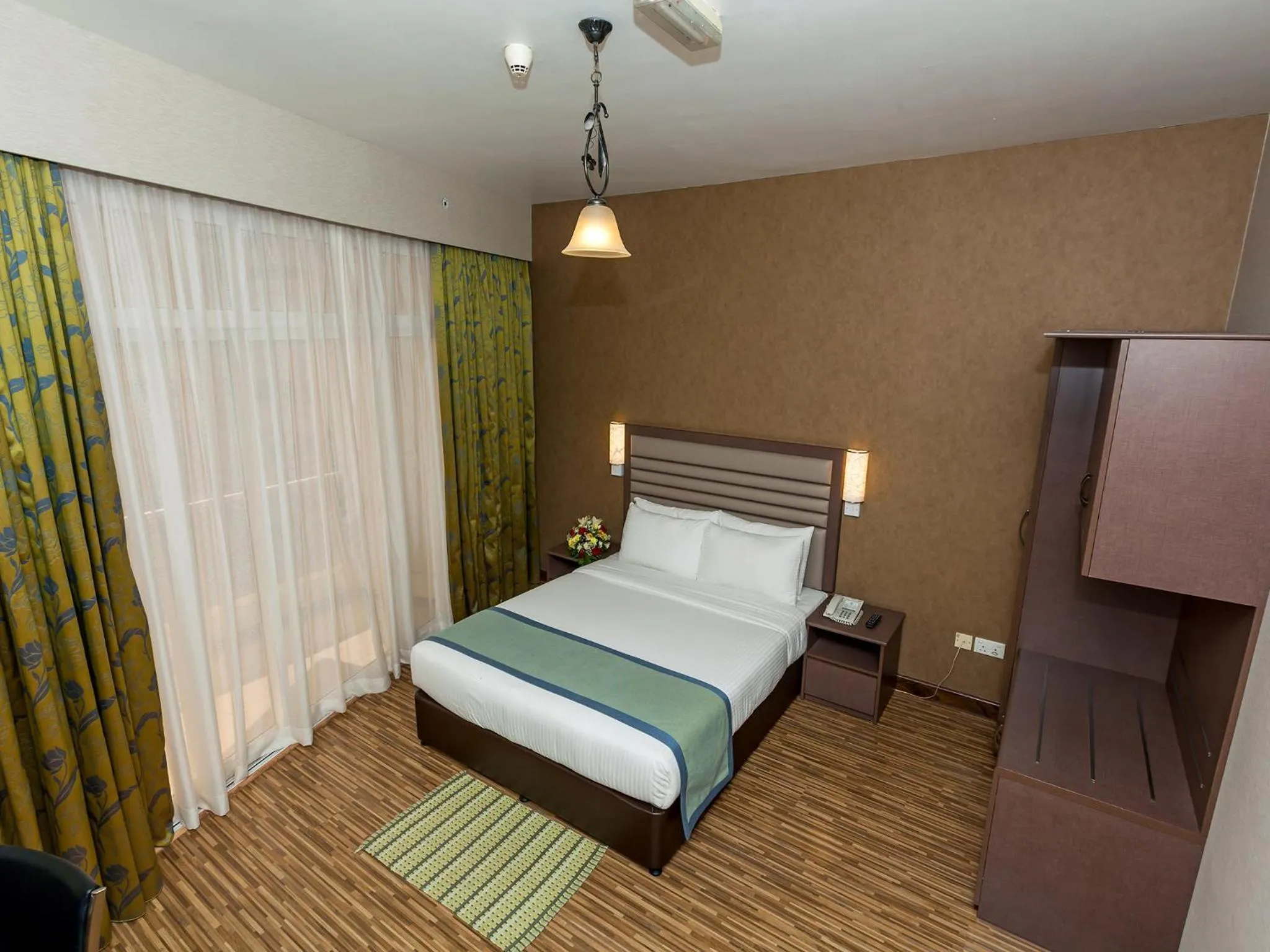 Bedroom, Bed in Wave International Hotel