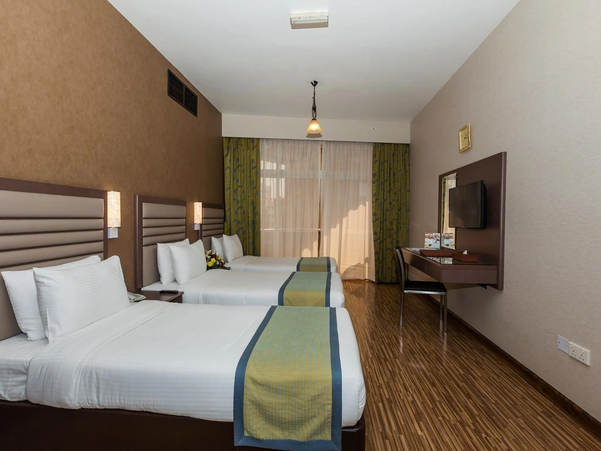 Coffee/tea facilities, Bed in Wave International Hotel