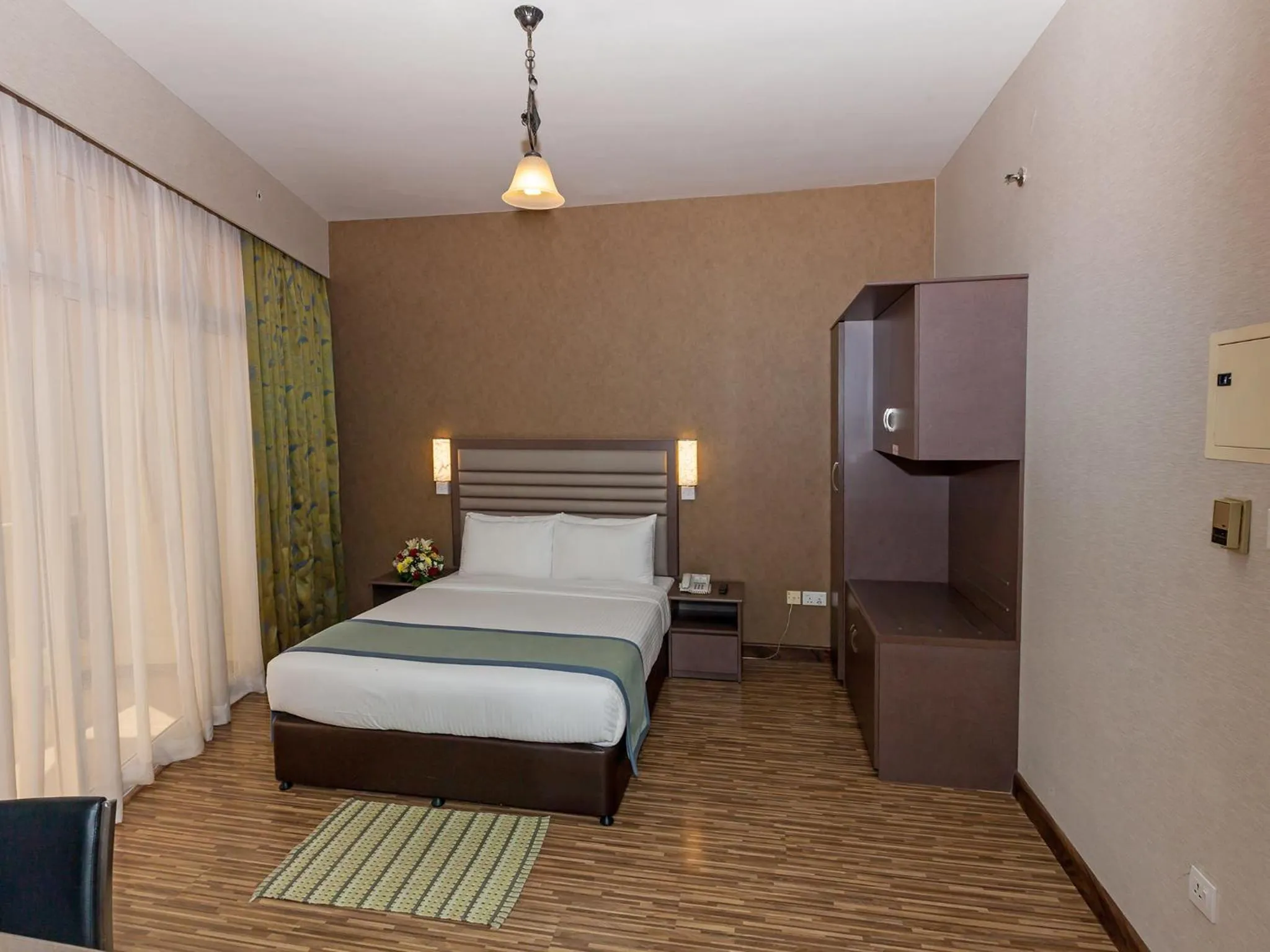 Bedroom, Bed in Wave International Hotel