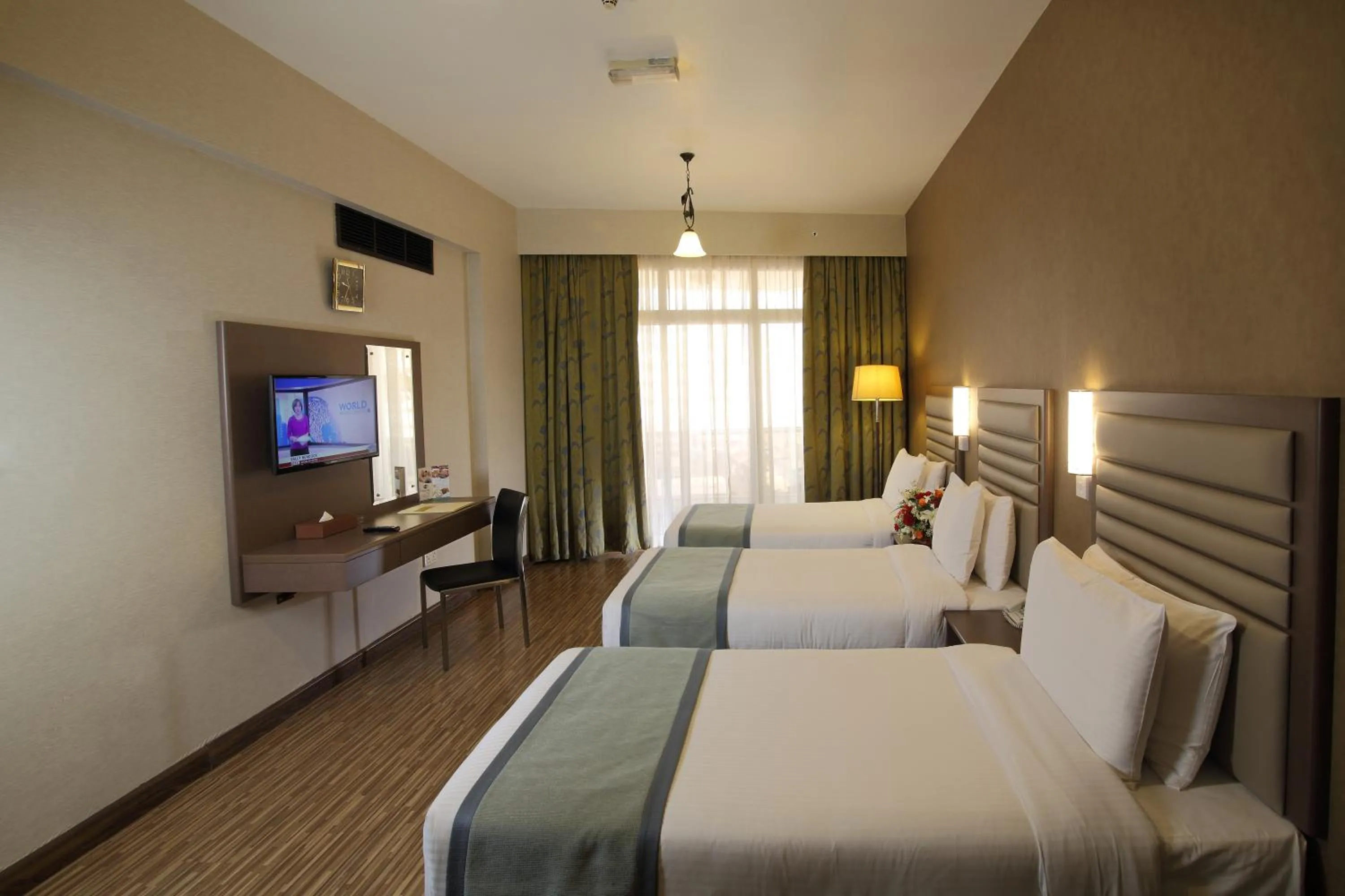 Photo of the whole room, Bed in Wave International Hotel