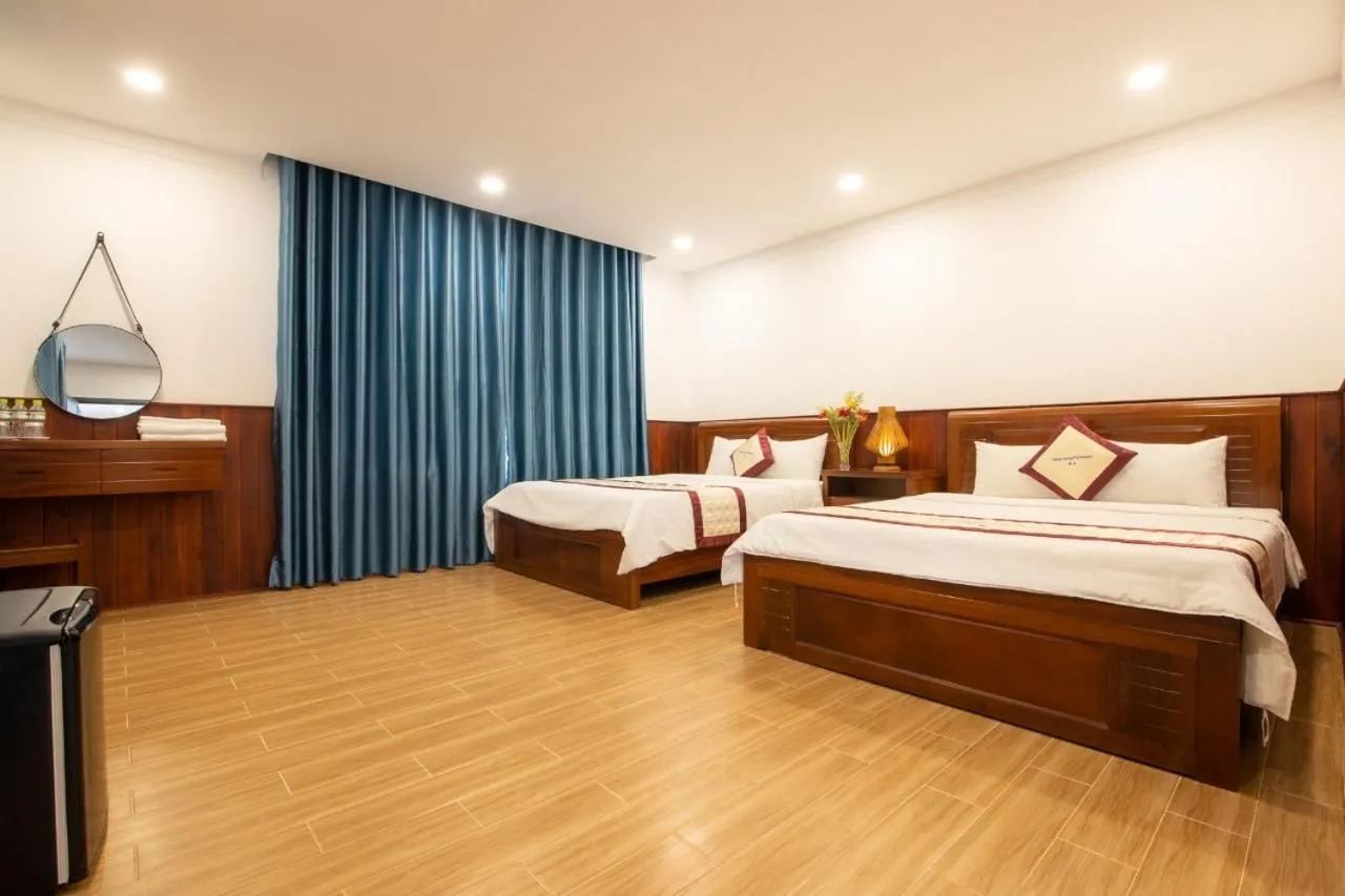 Bed in Hung Vuong Resort