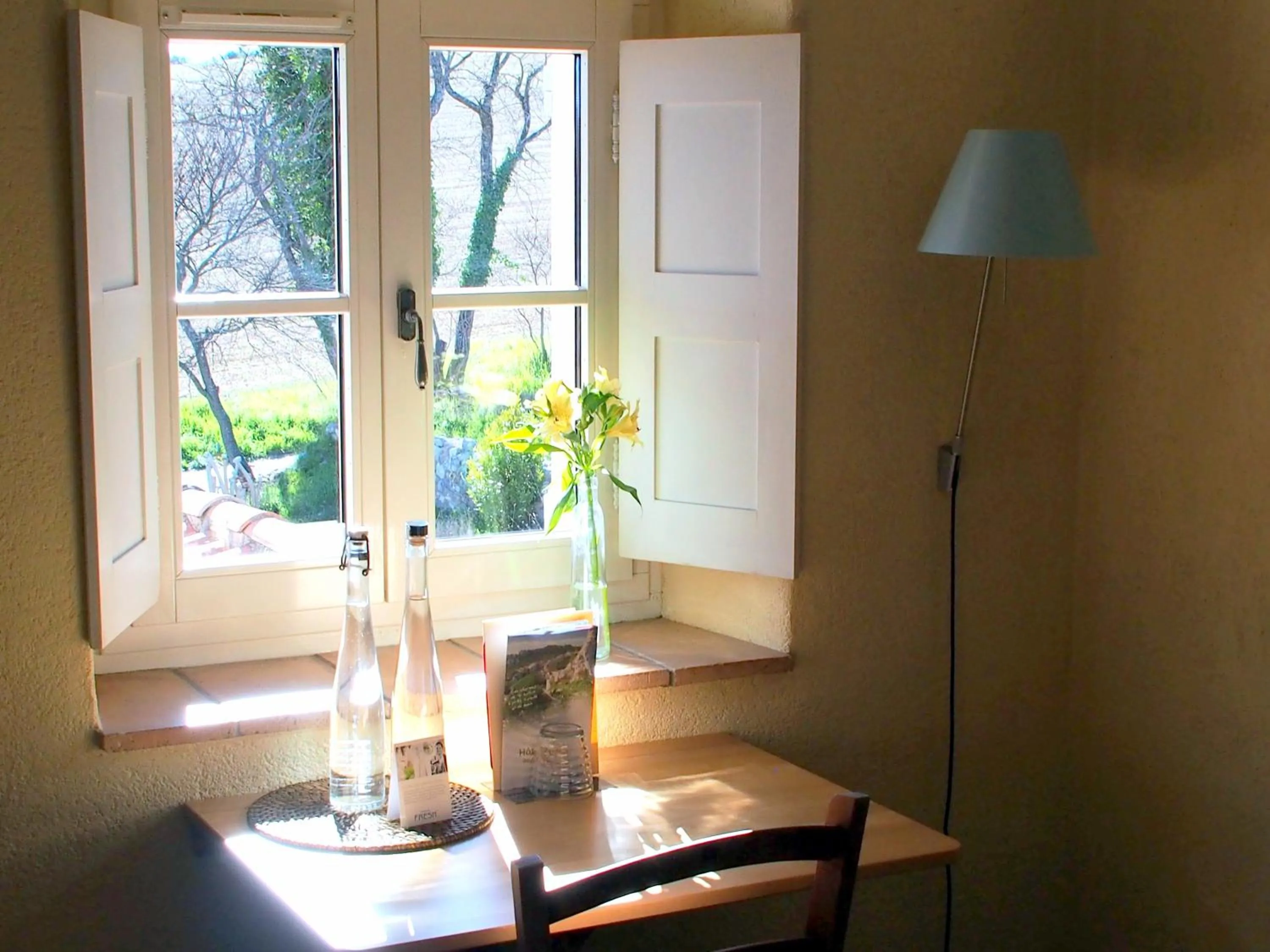 Seating area in Hotel Le Moulin du Château