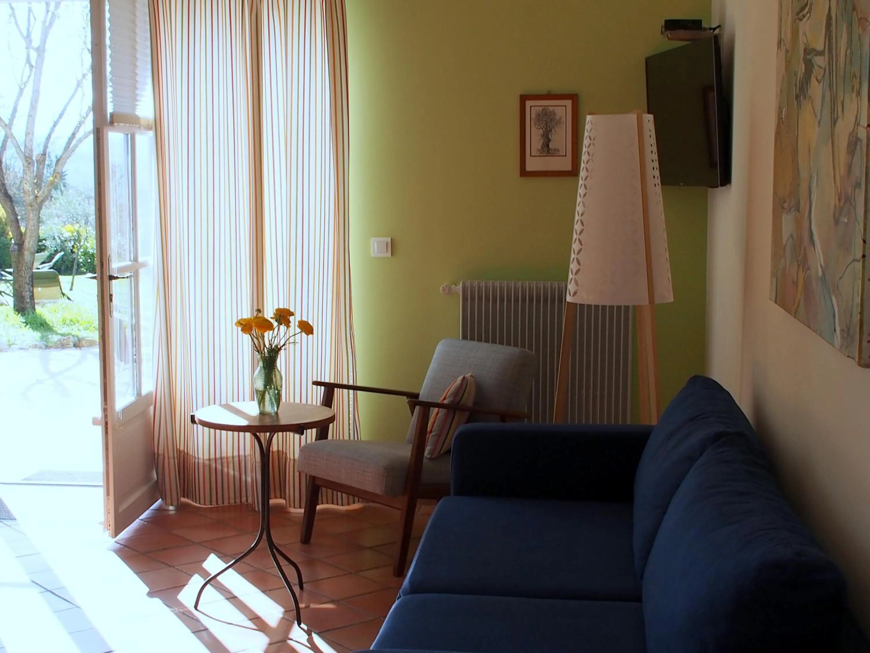 Seating area in Hotel Le Moulin du Château