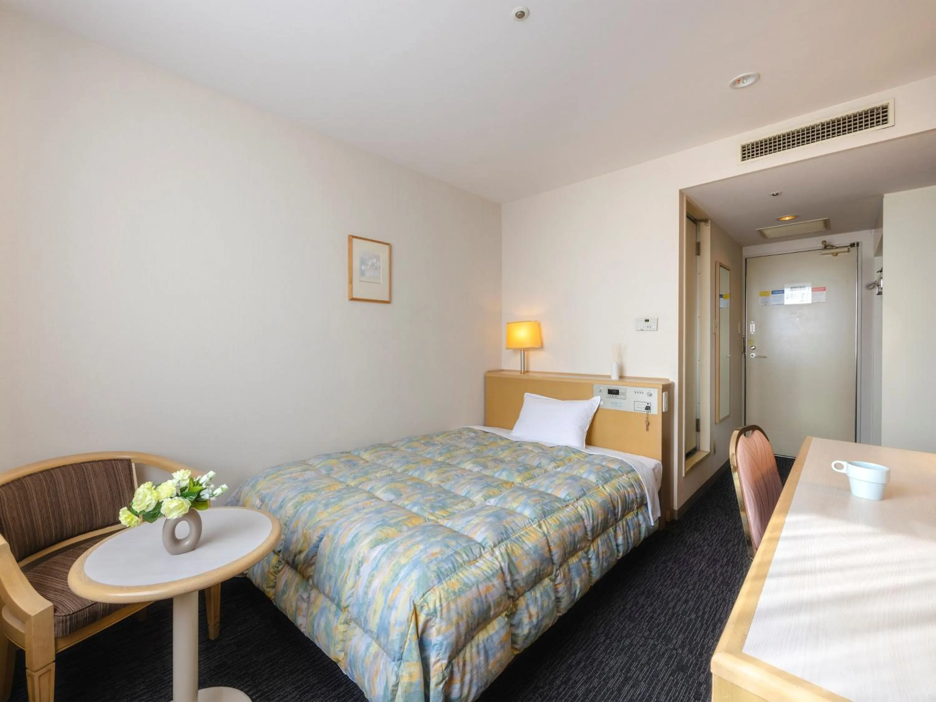 Bed in Tsubamesanjo Washington Hotel