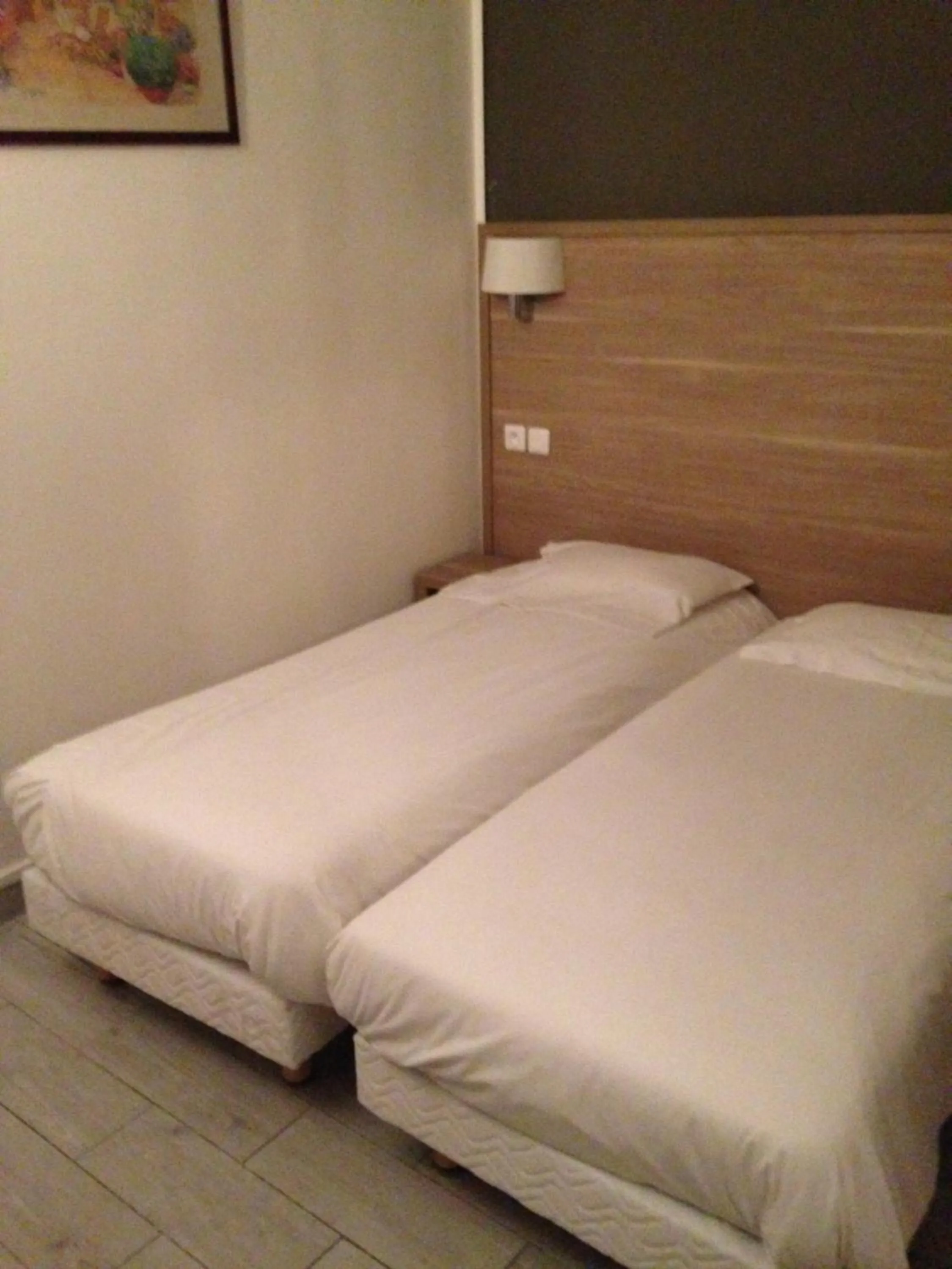 Bedroom, Bed in Hotel Montana Paris Lafayette