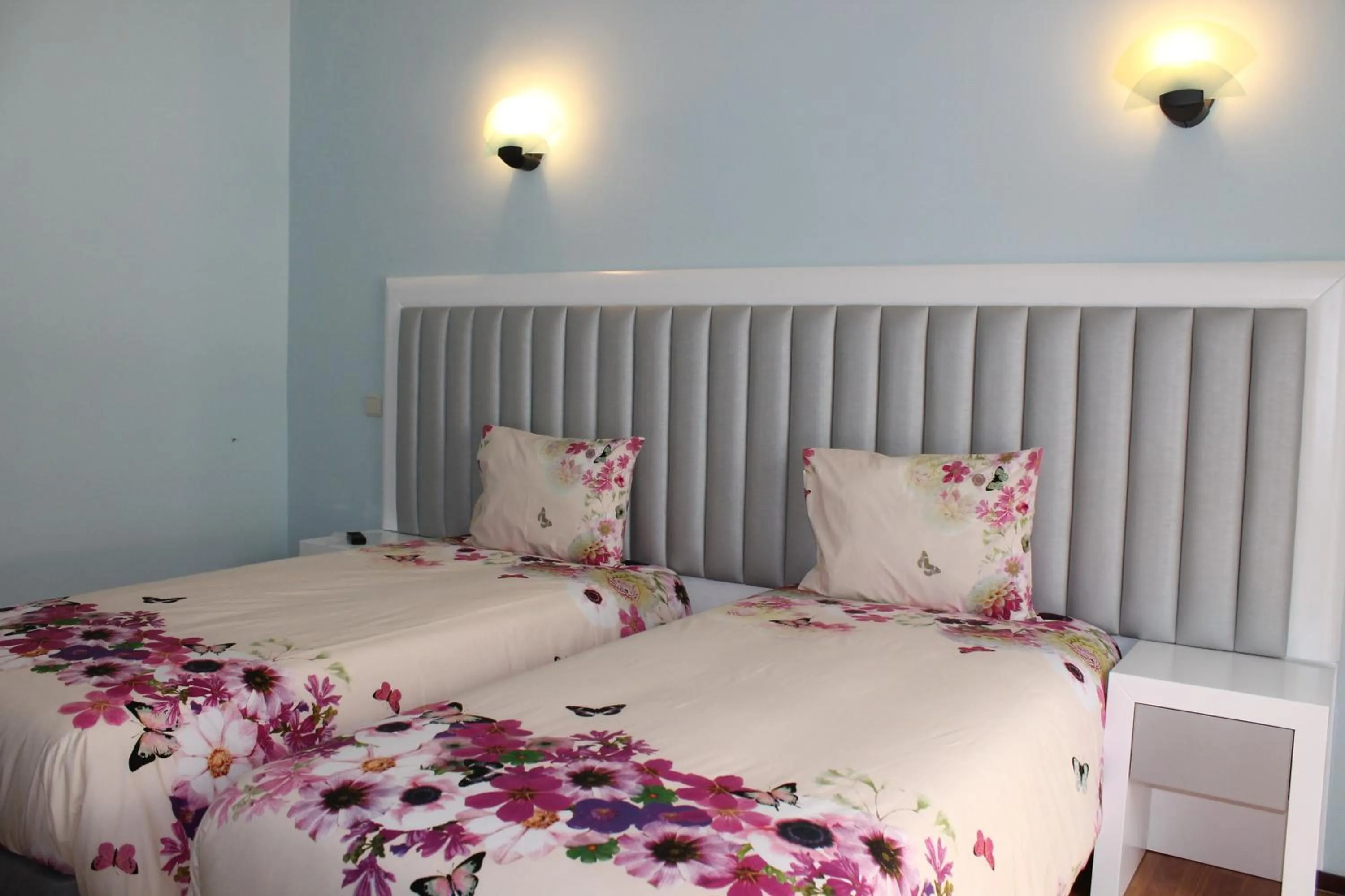 Bedroom, Bed in Grande Oceano Guest House