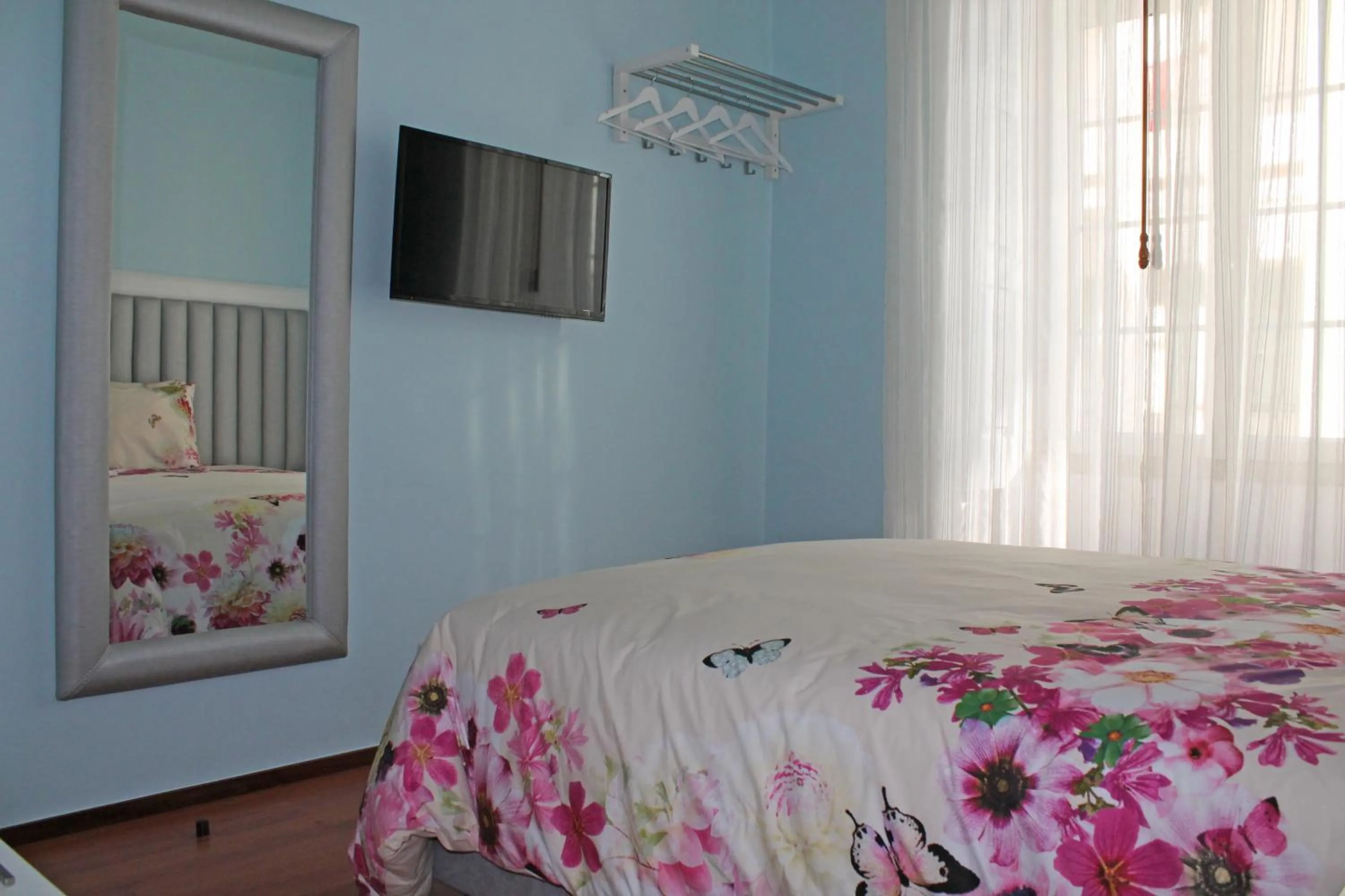 Bedroom, Bed in Grande Oceano Guest House