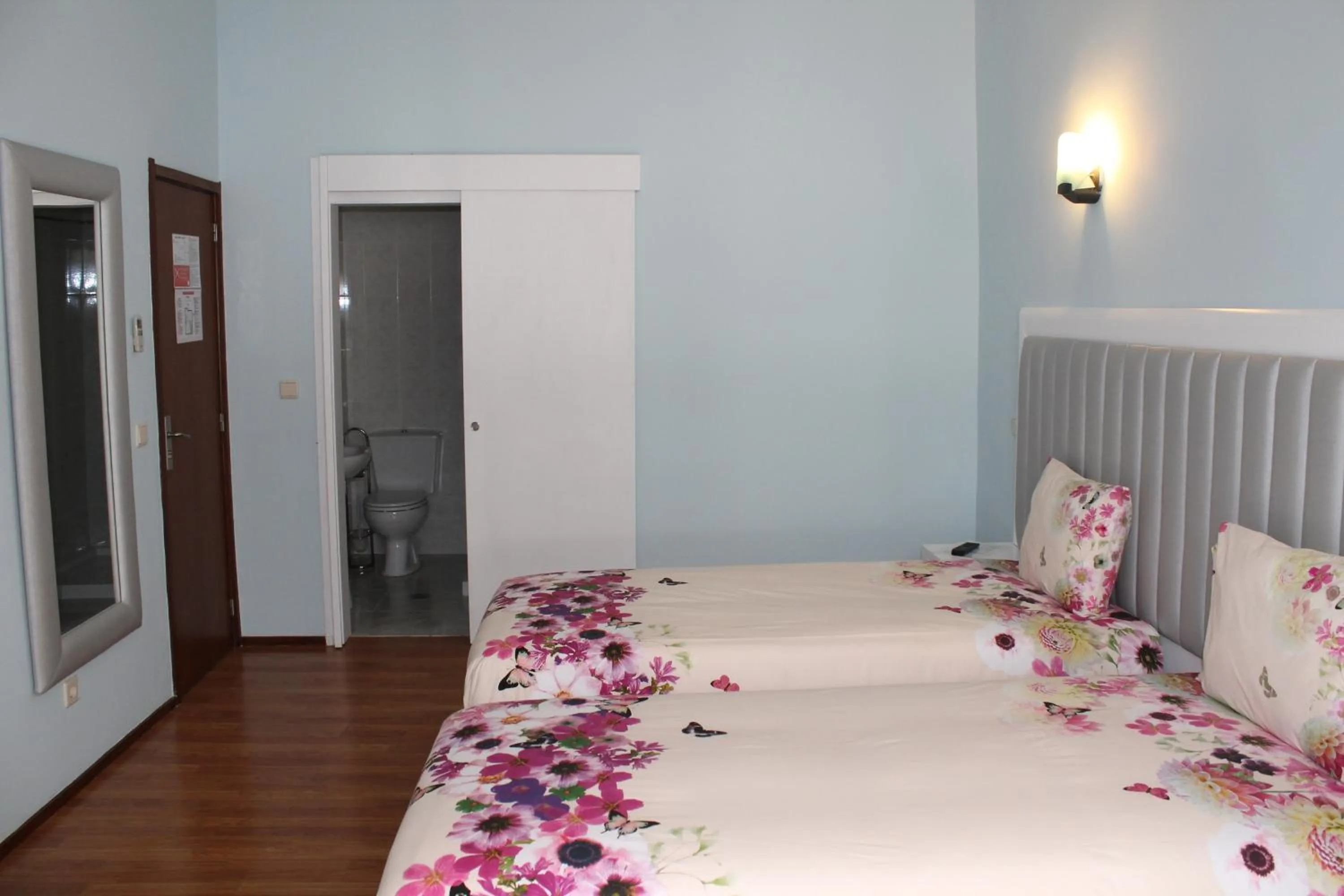 Bedroom, Bed in Grande Oceano Guest House