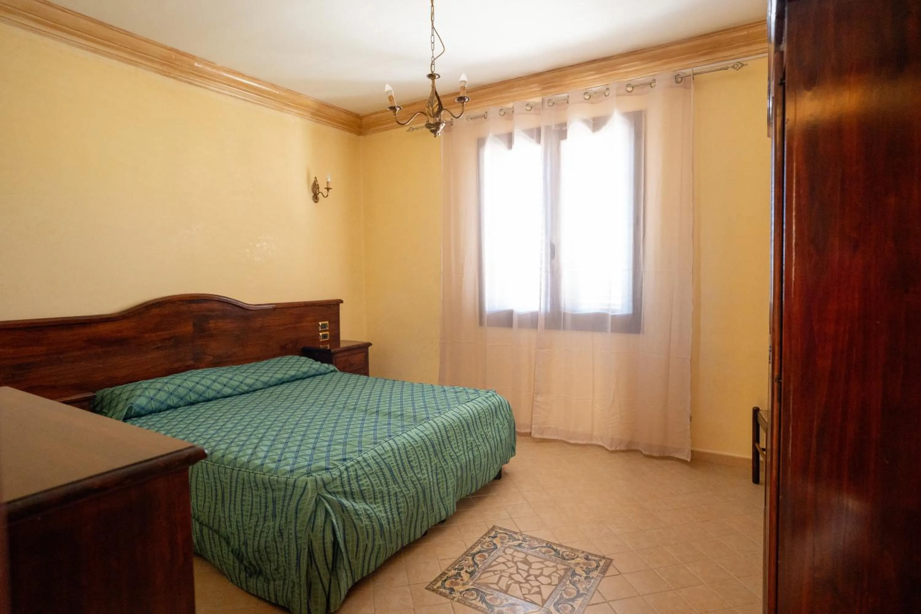 Bed in Triscinamare Hotel Residence