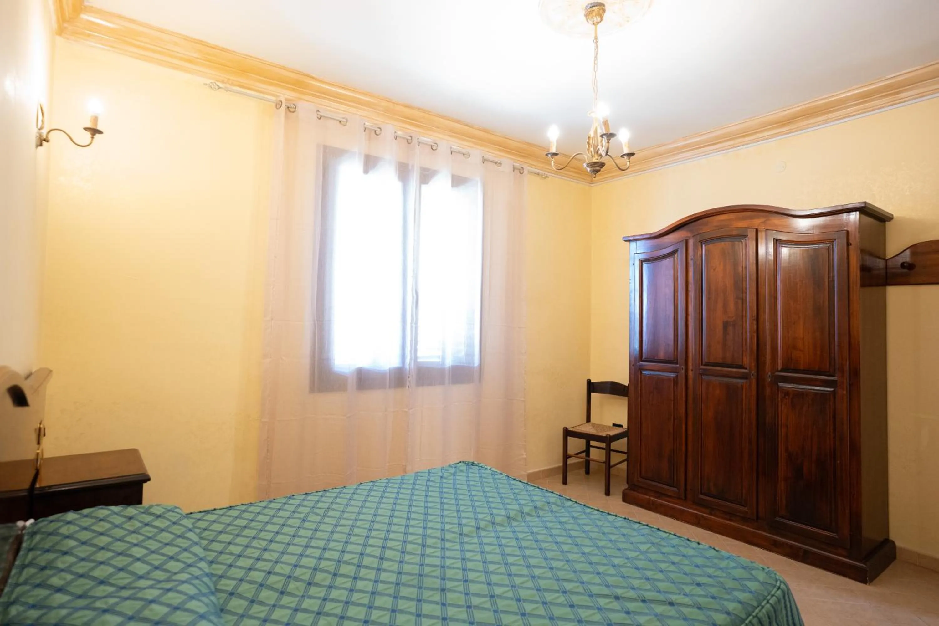 Bed in Triscinamare Hotel Residence