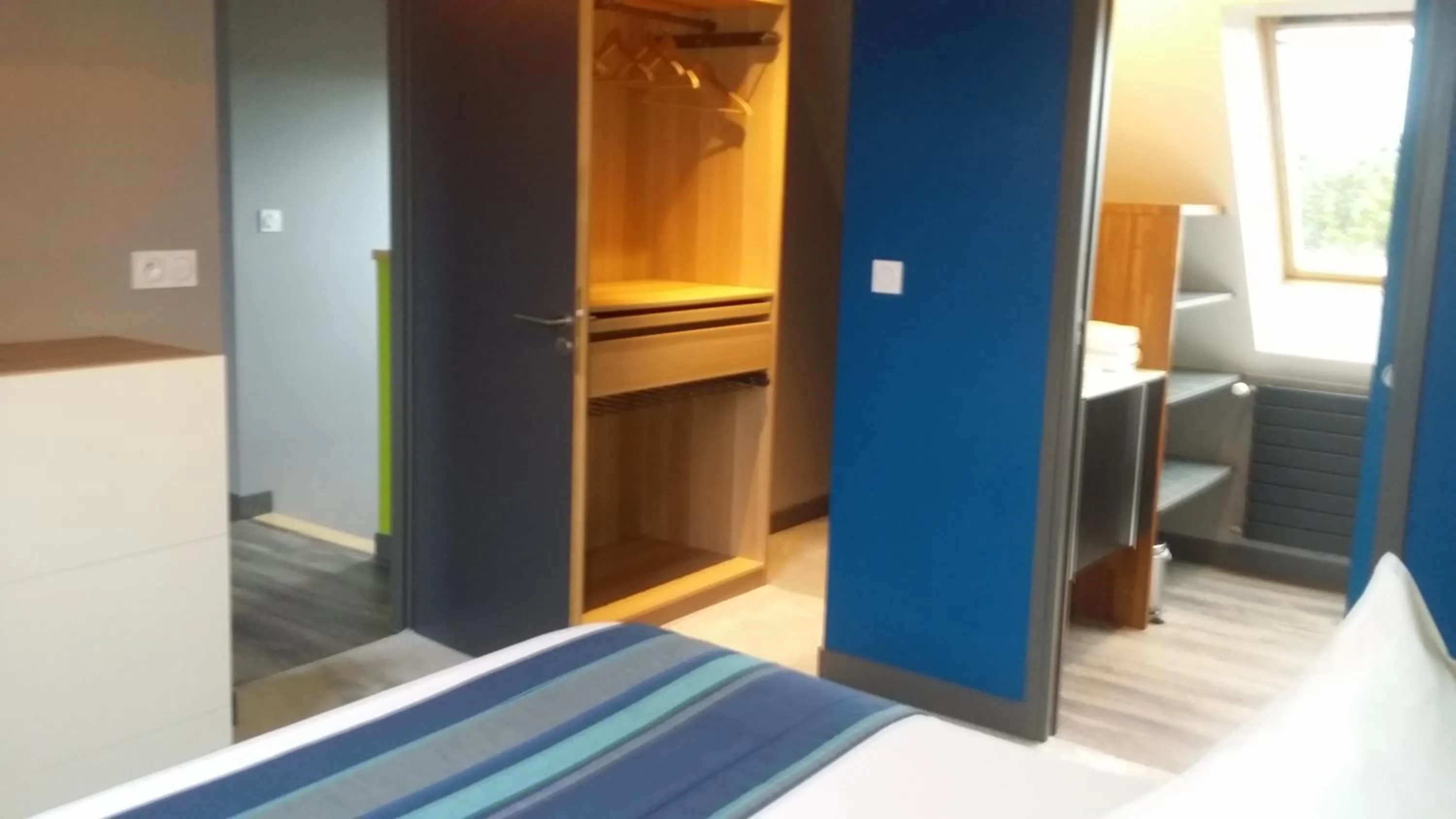 Bed in Hôtel des Rochers