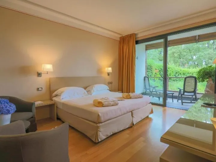 Bed in Hotel Acquaviva Del Garda