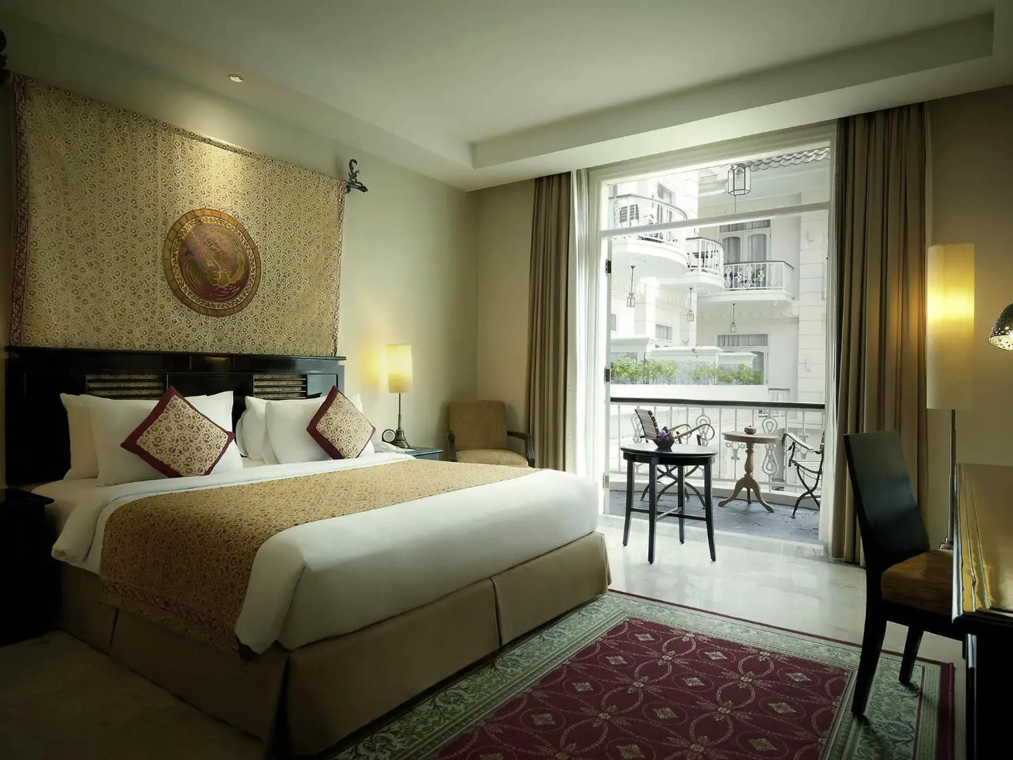 Bedroom, Bed in The Phoenix Hotel Yogyakarta - Handwritten Collection Bedroom, Bed in The Phoenix Hotel Yogyakarta - Handwritten Collection