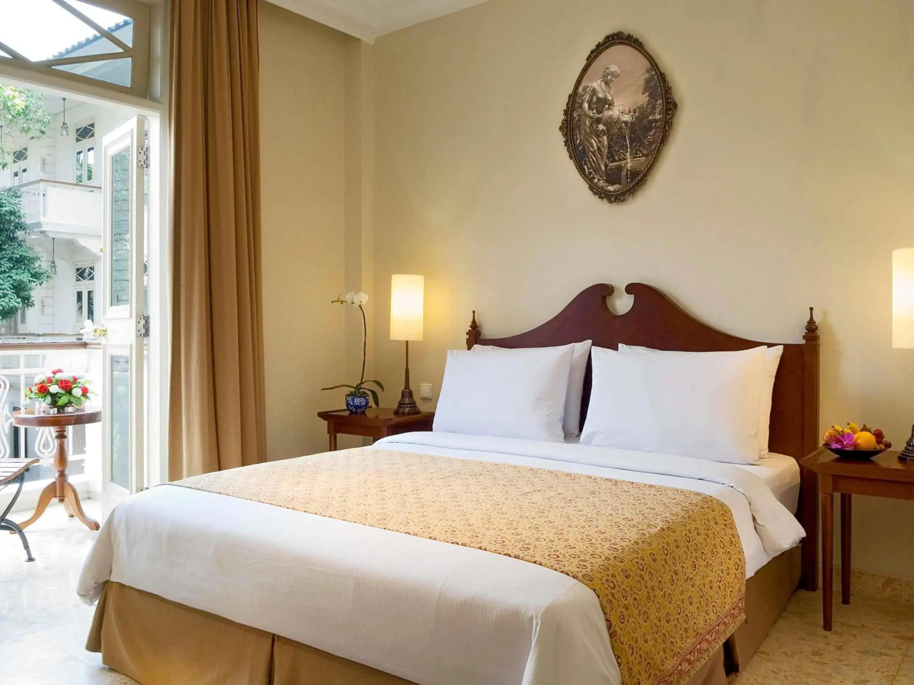 Bedroom, Bed in The Phoenix Hotel Yogyakarta - Handwritten Collection Bedroom, Bed in The Phoenix Hotel Yogyakarta - Handwritten Collection