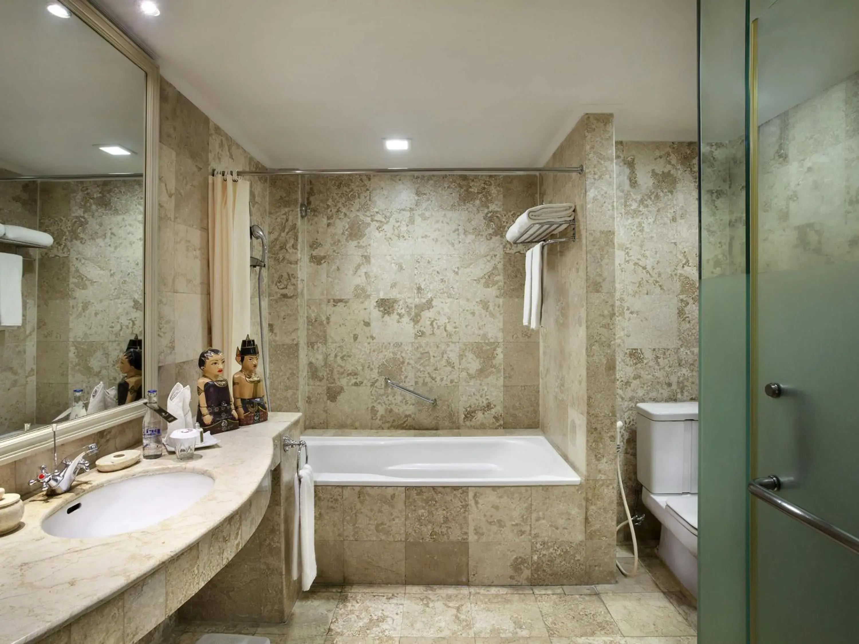 Bedroom in The Phoenix Hotel Yogyakarta - Handwritten Collection Bedroom in The Phoenix Hotel Yogyakarta - Handwritten Collection