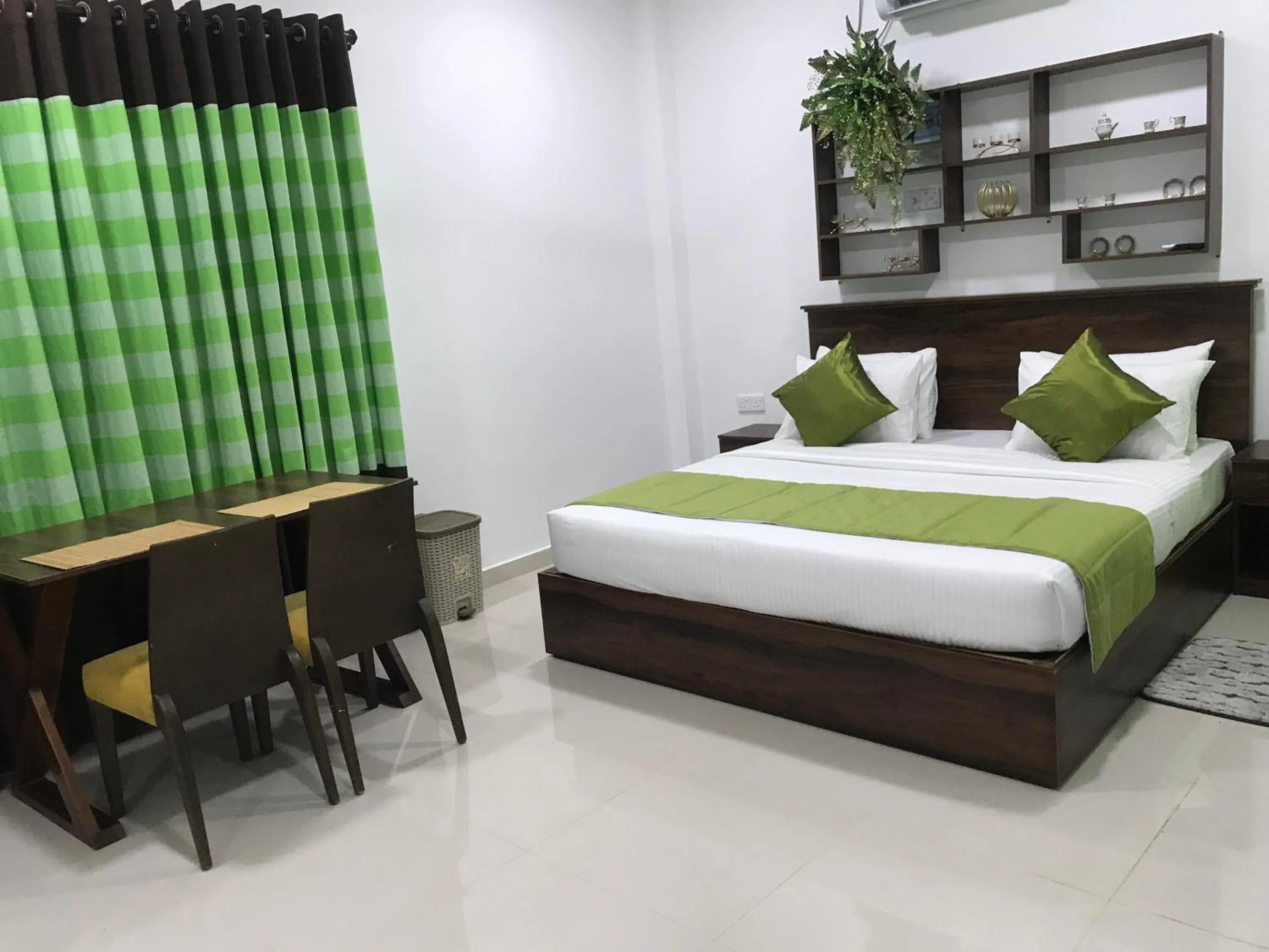 Bed in Cinnamon Airport Residencies