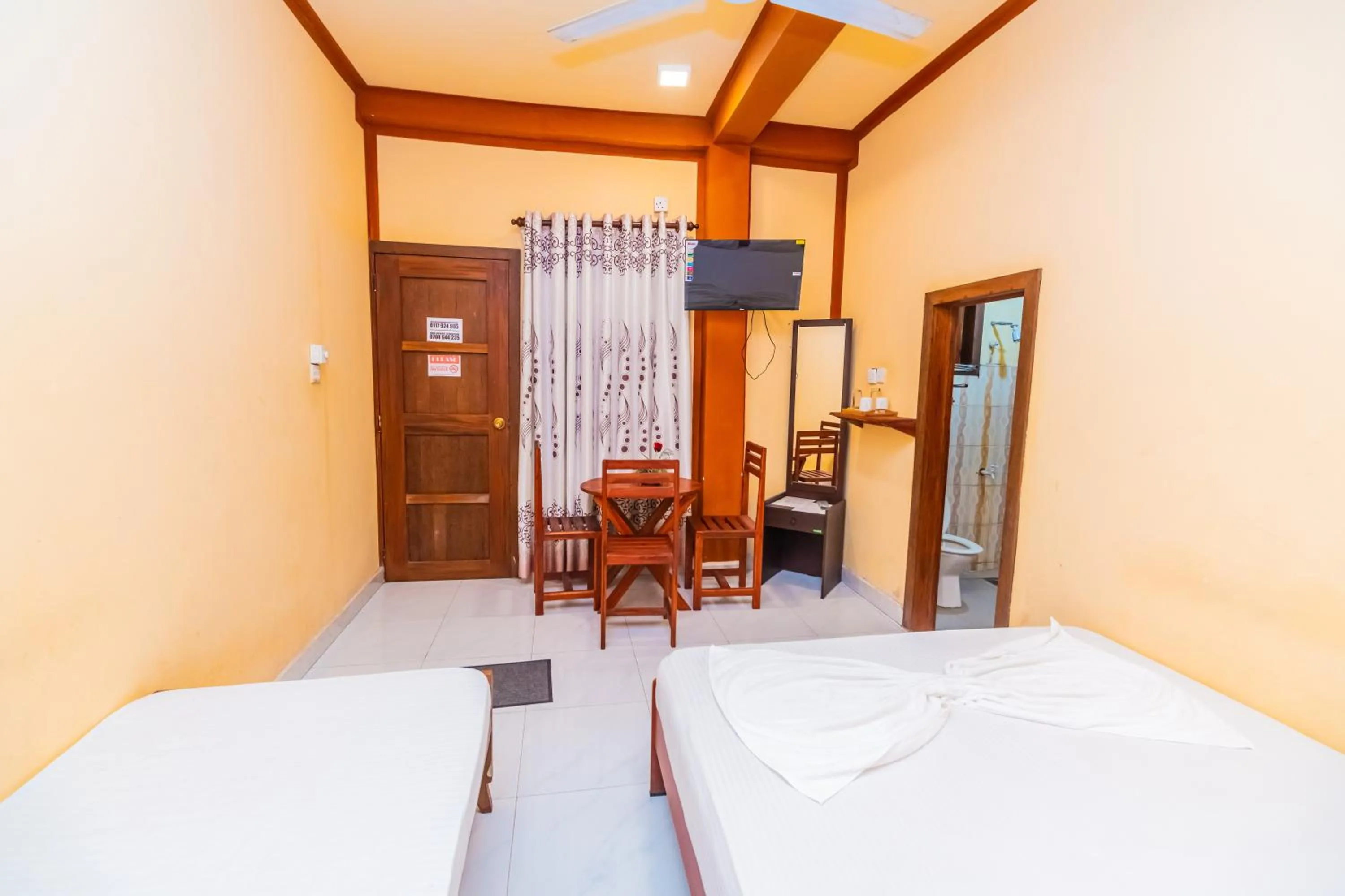 Bed in Cinnamon Airport Residencies