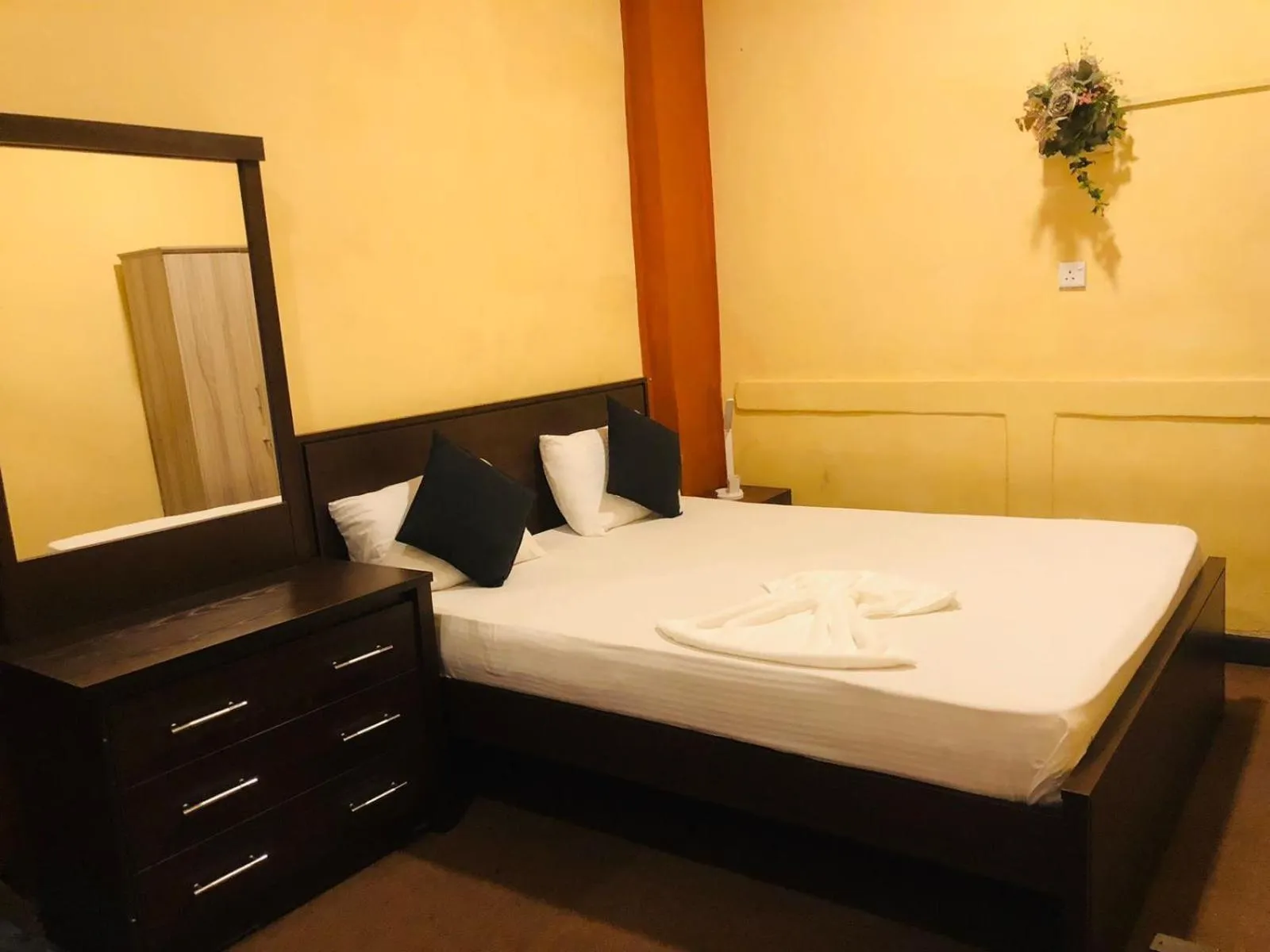 Bed in Cinnamon Airport Residencies