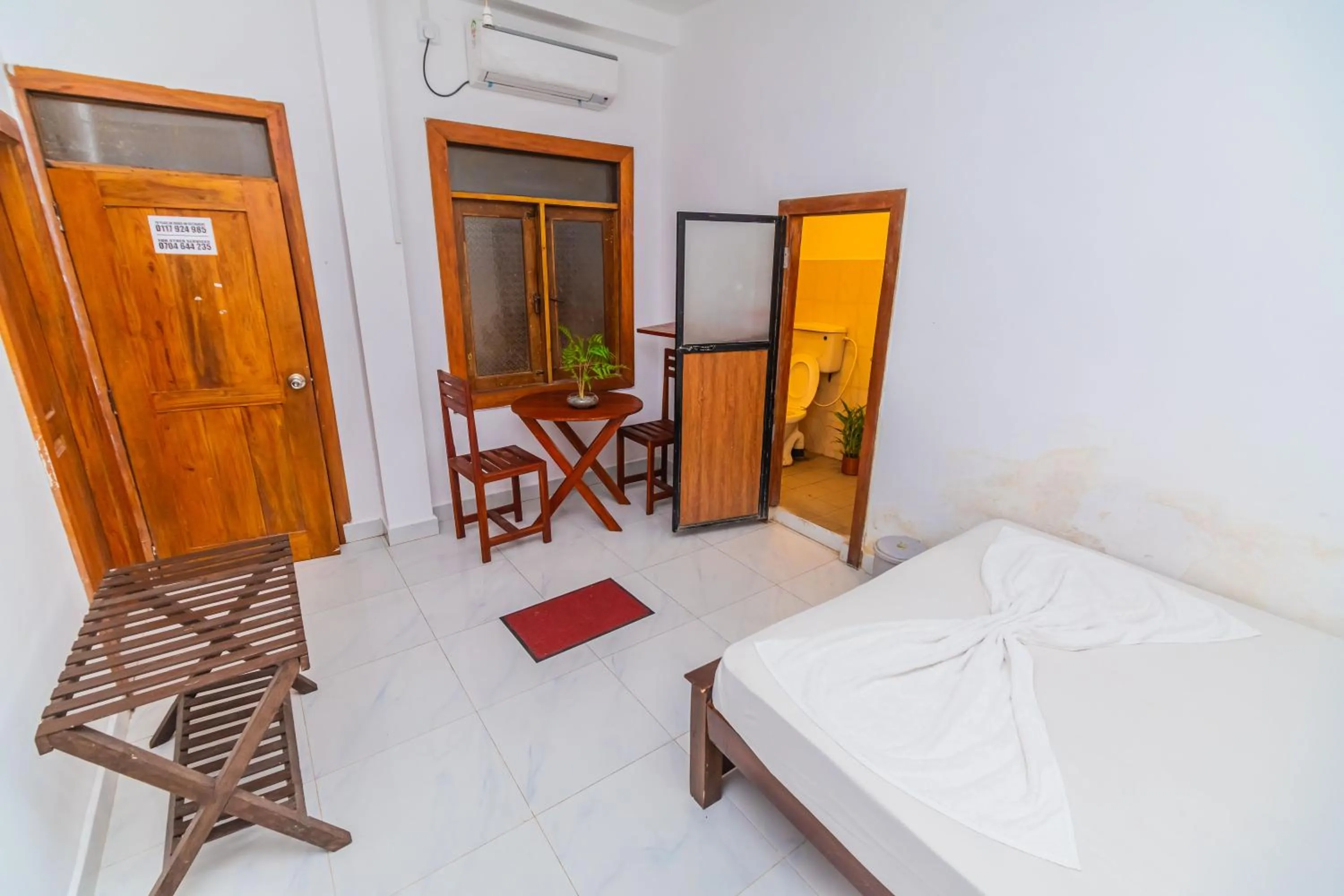 Bed in Cinnamon Airport Residencies