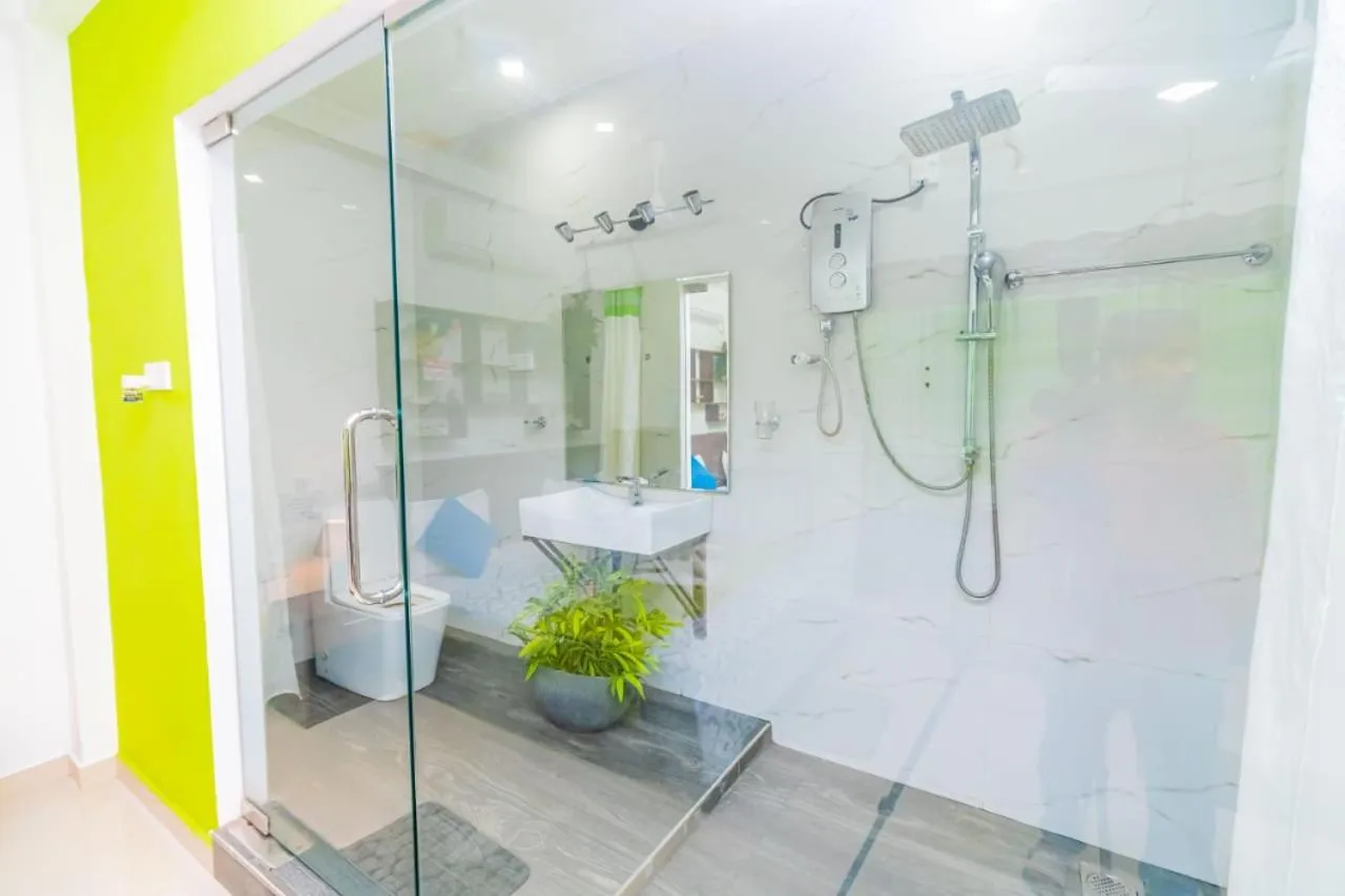 Shower in Cinnamon Airport Residencies