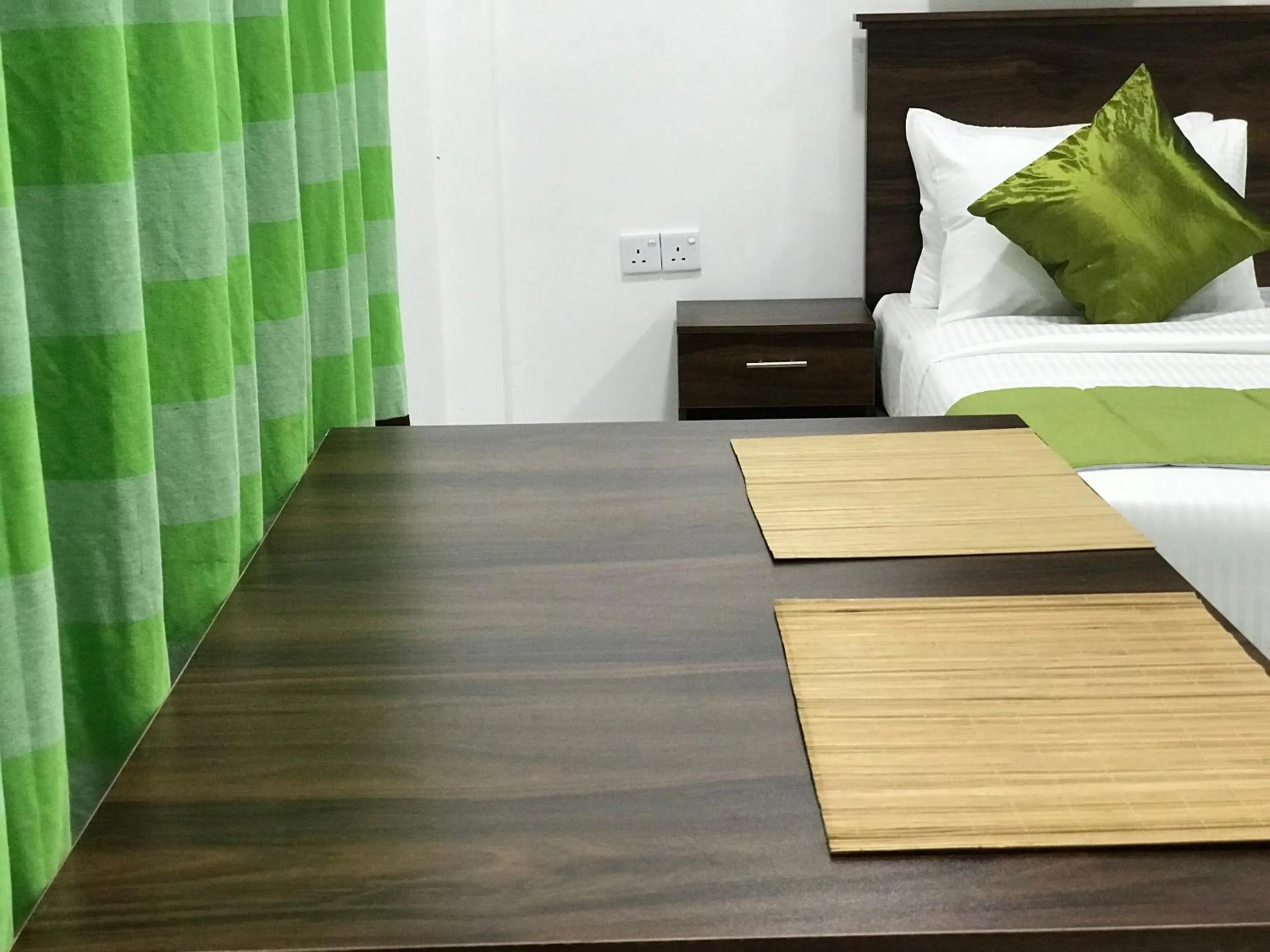 Bed in Cinnamon Airport Residencies