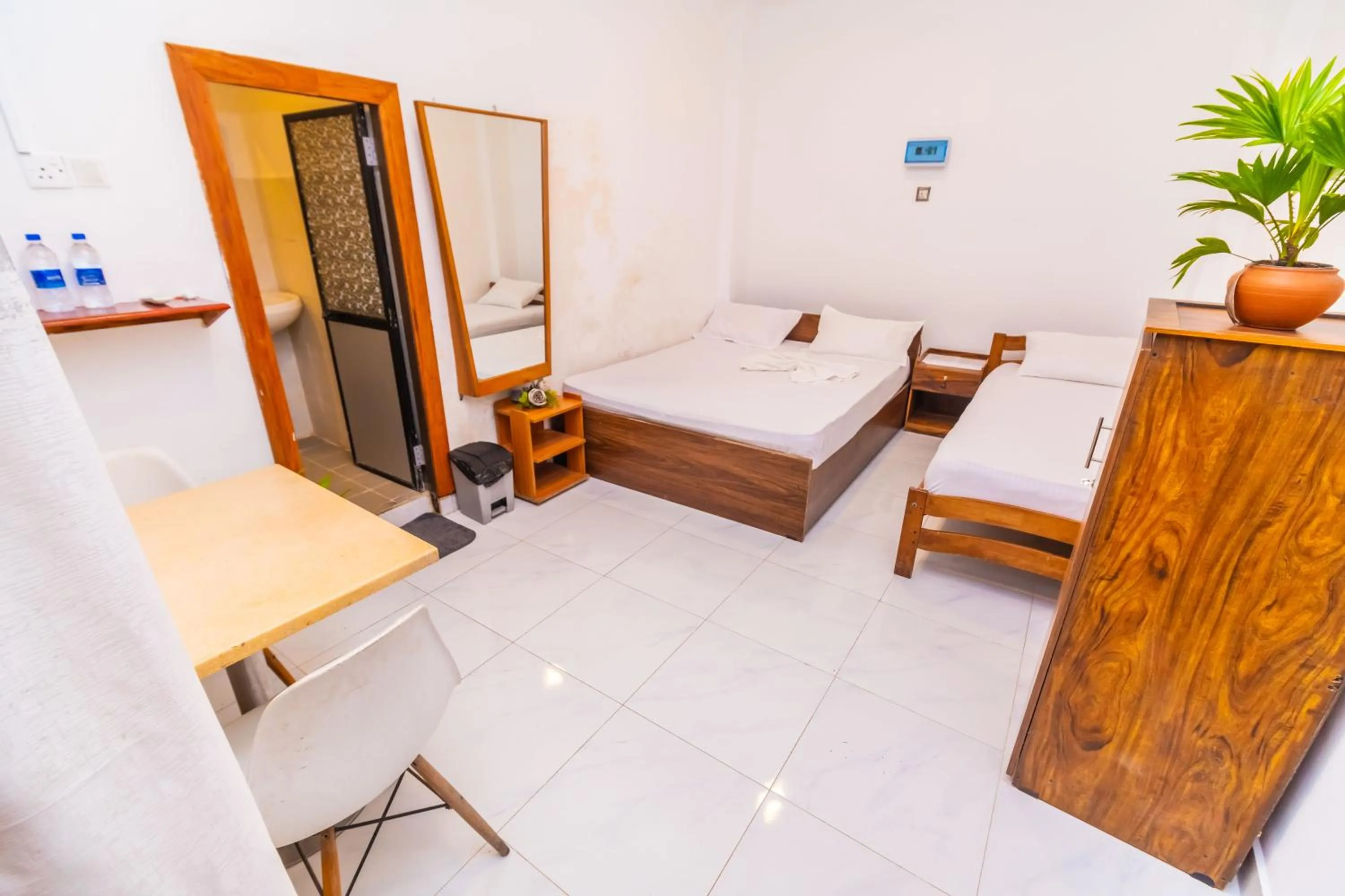 Bed in Cinnamon Airport Residencies