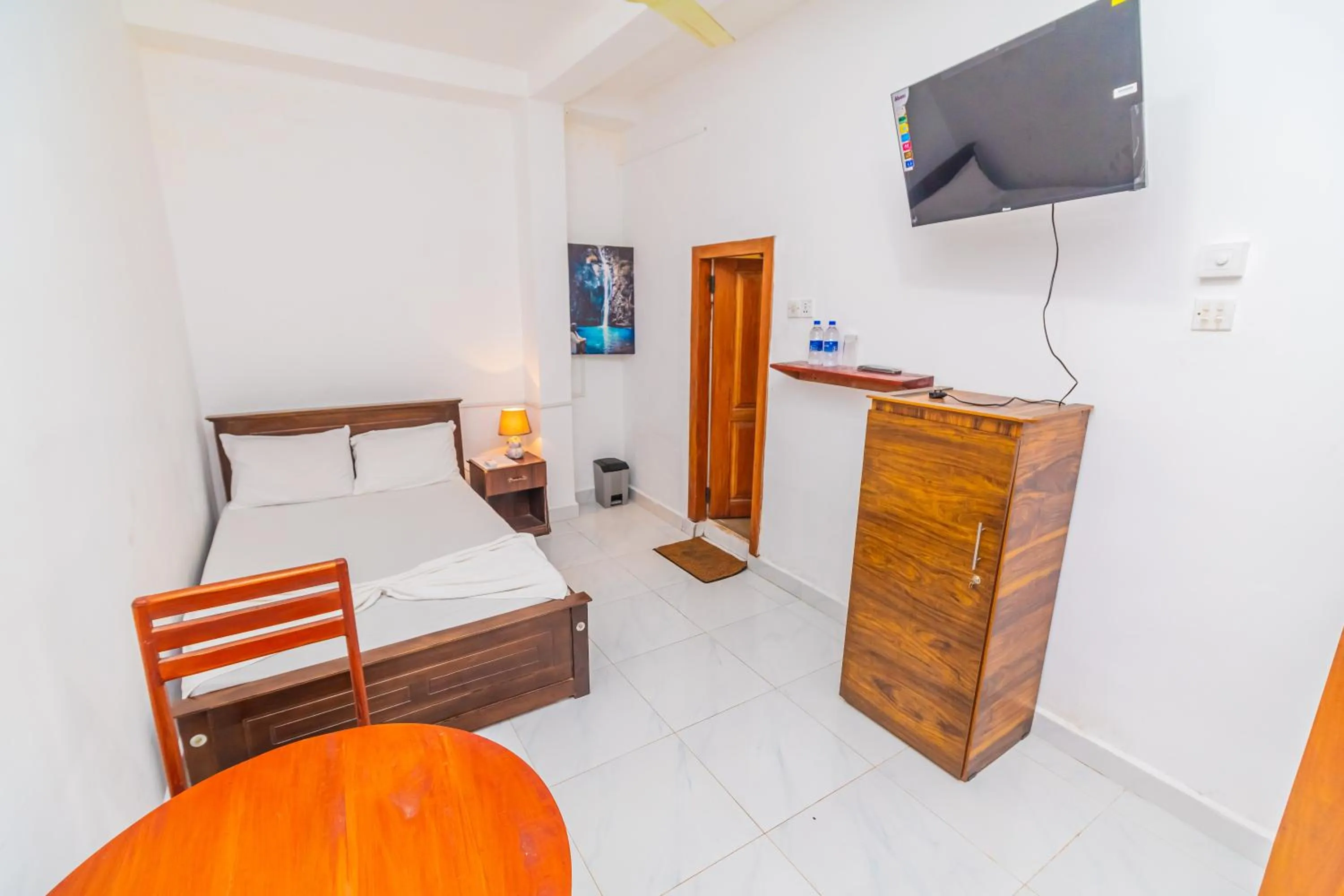 Bed in Cinnamon Airport Residencies