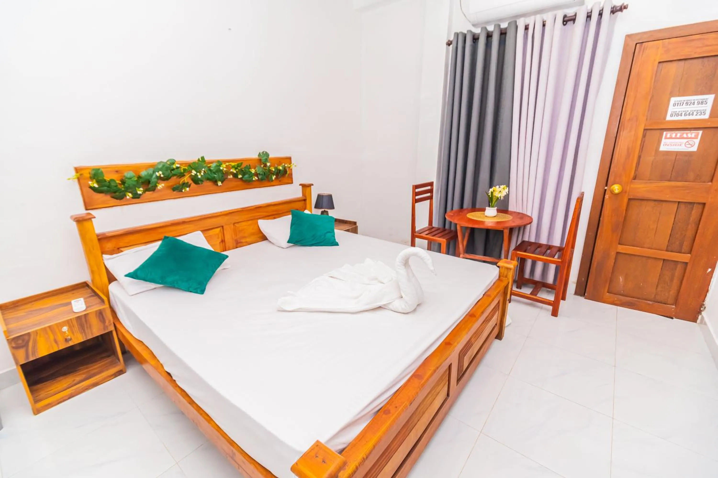 Bed in Cinnamon Airport Residencies