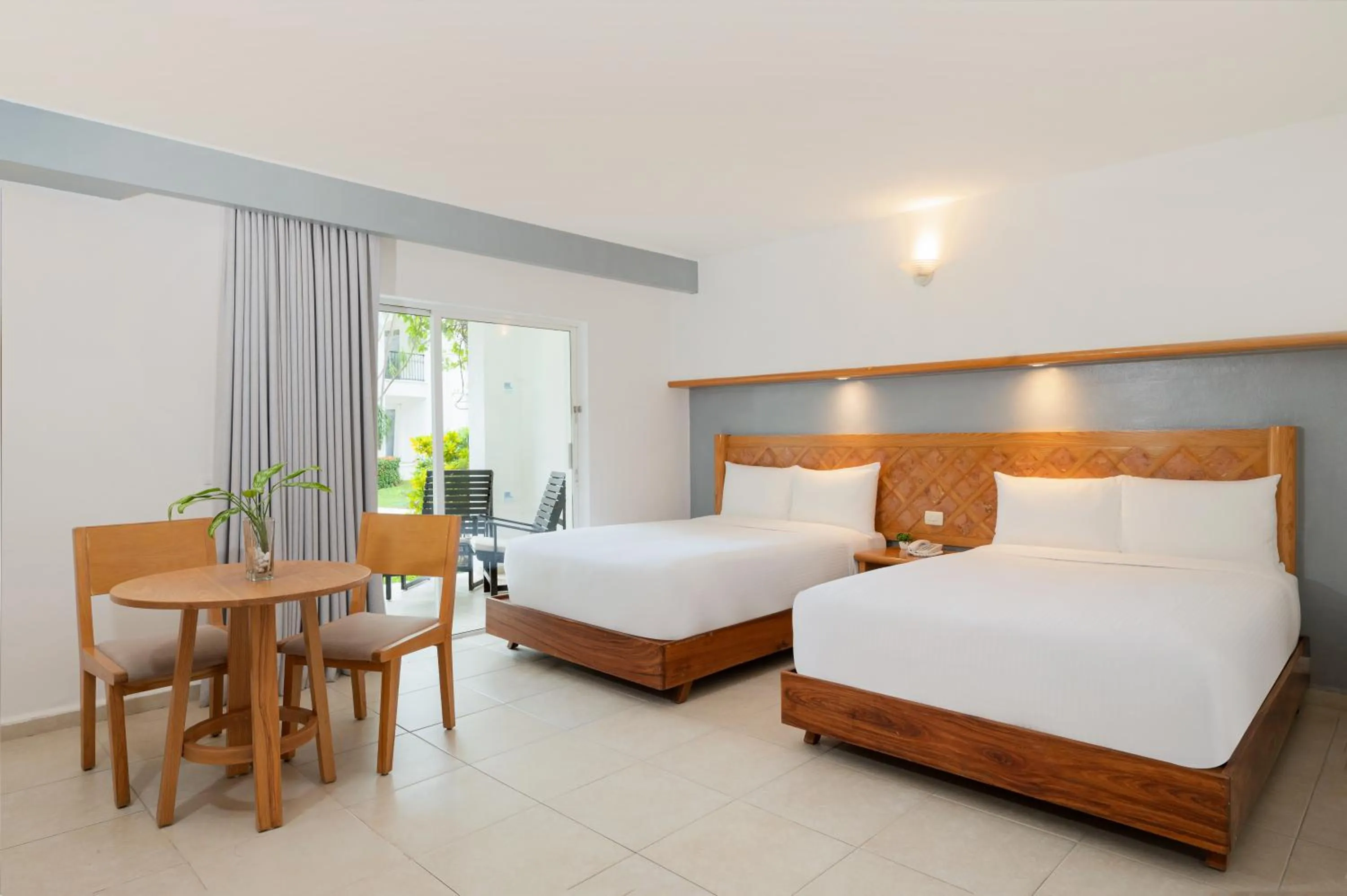 Bed in Beachscape Kin Ha Villas & Suites