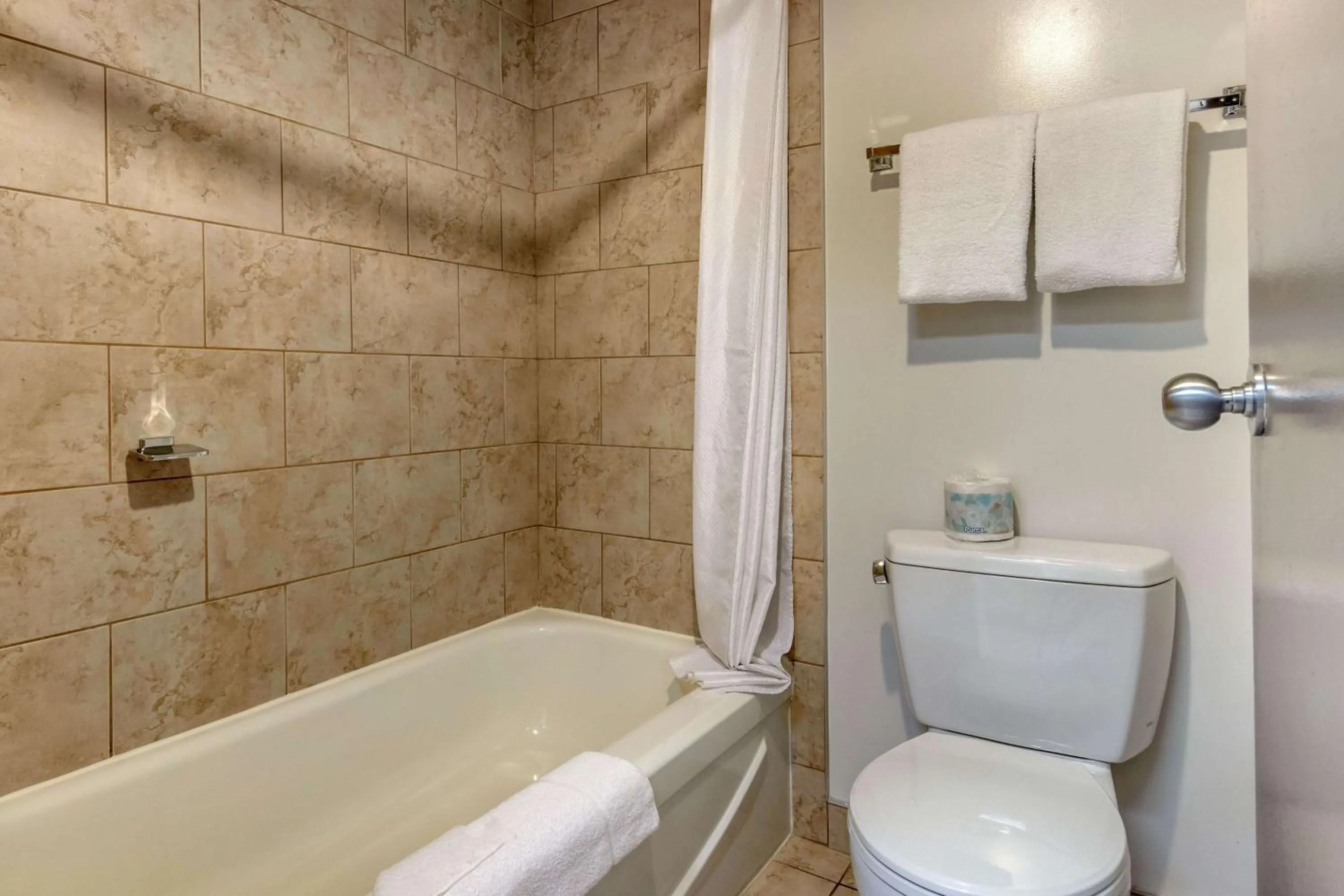 Bathroom in Super 8 by Wyndham Macleod Trail Calgary