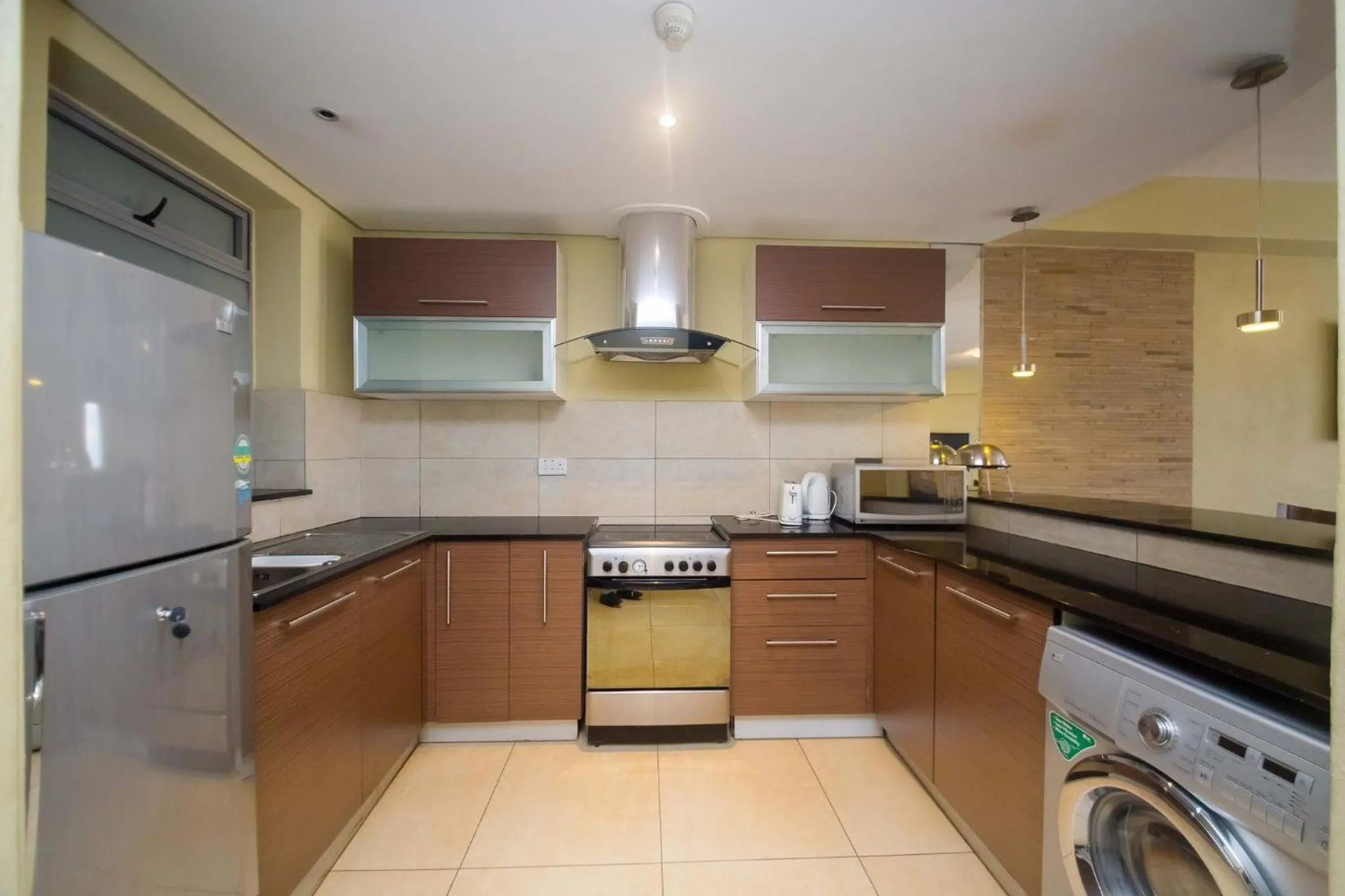 Kitchen or kitchenette in Taarifa Suites by Dunhill Serviced Apartments