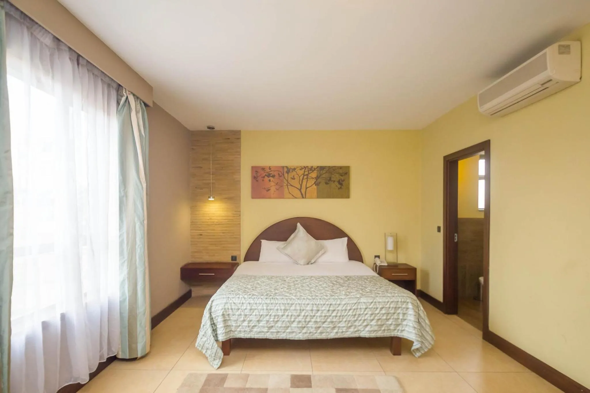 Photo of the whole room, Bed in Taarifa Suites by Dunhill Serviced Apartments