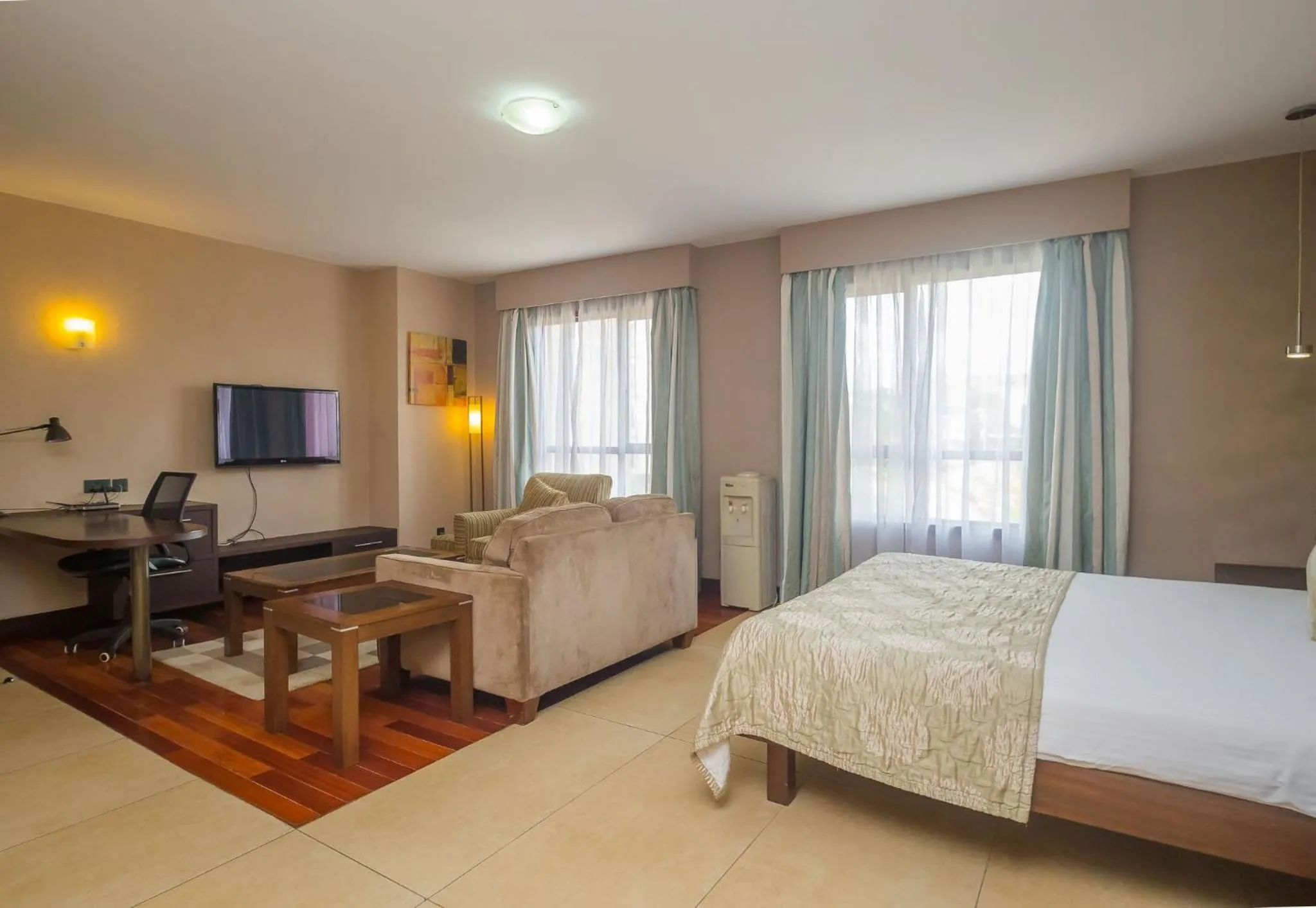 Photo of the whole room, Bed in Taarifa Suites by Dunhill Serviced Apartments