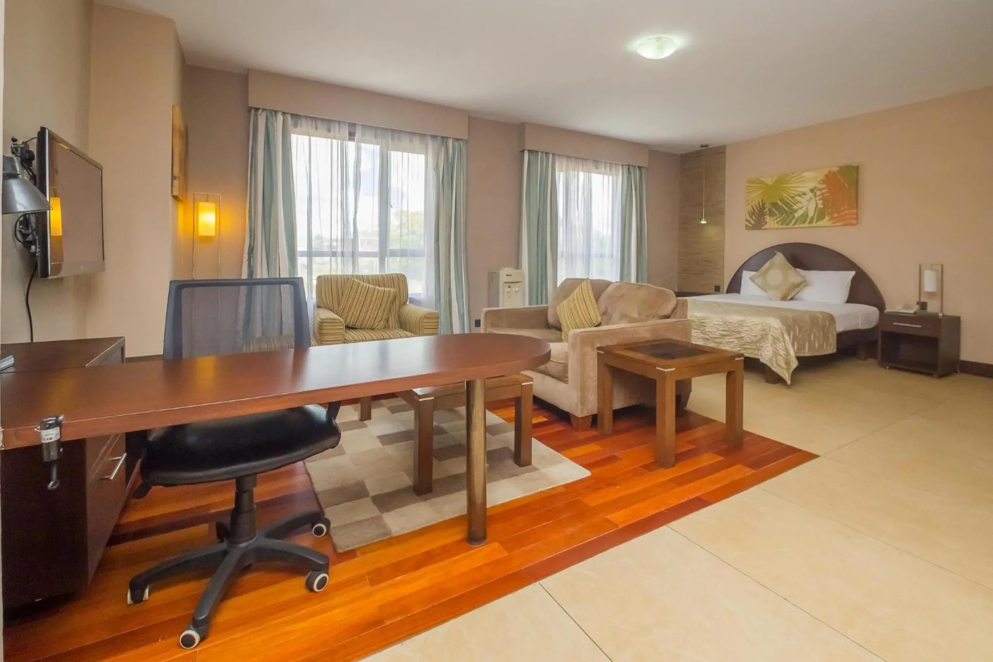 Living room, Bed in Taarifa Suites by Dunhill Serviced Apartments