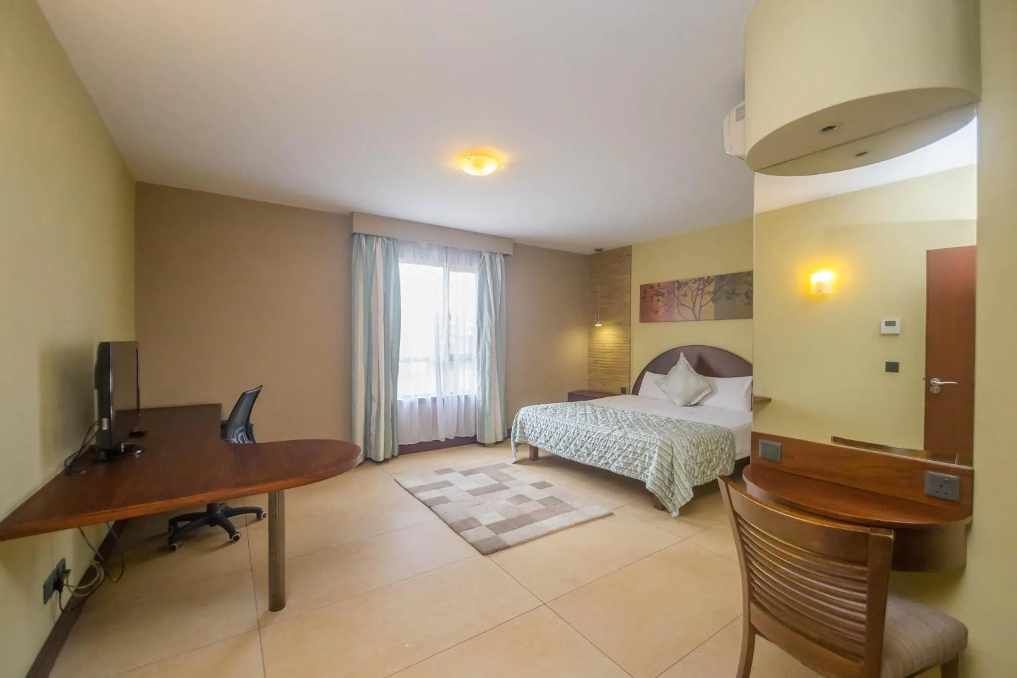 Bedroom, Bed in Taarifa Suites by Dunhill Serviced Apartments