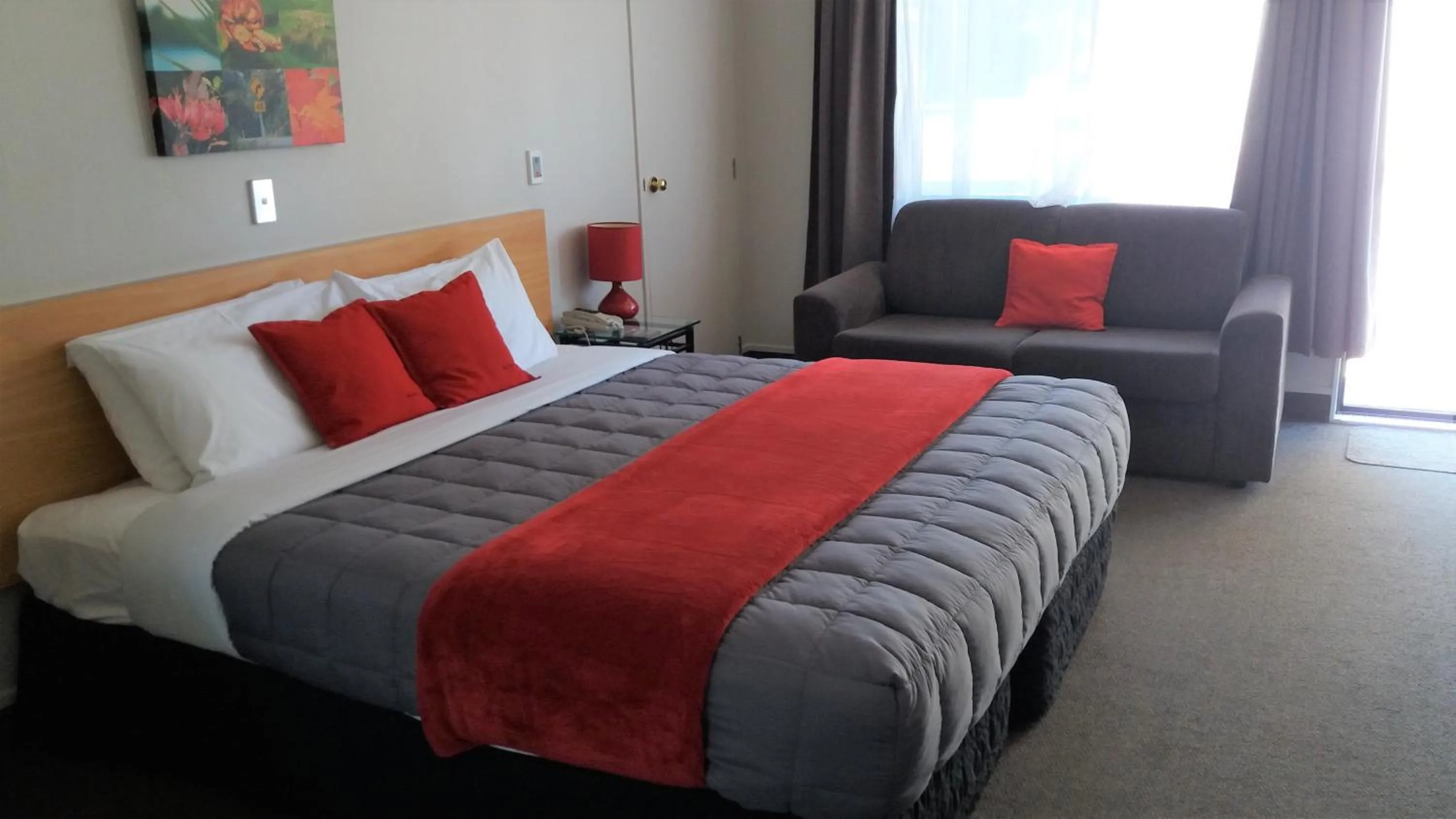 Bed in Bay Palm Motel