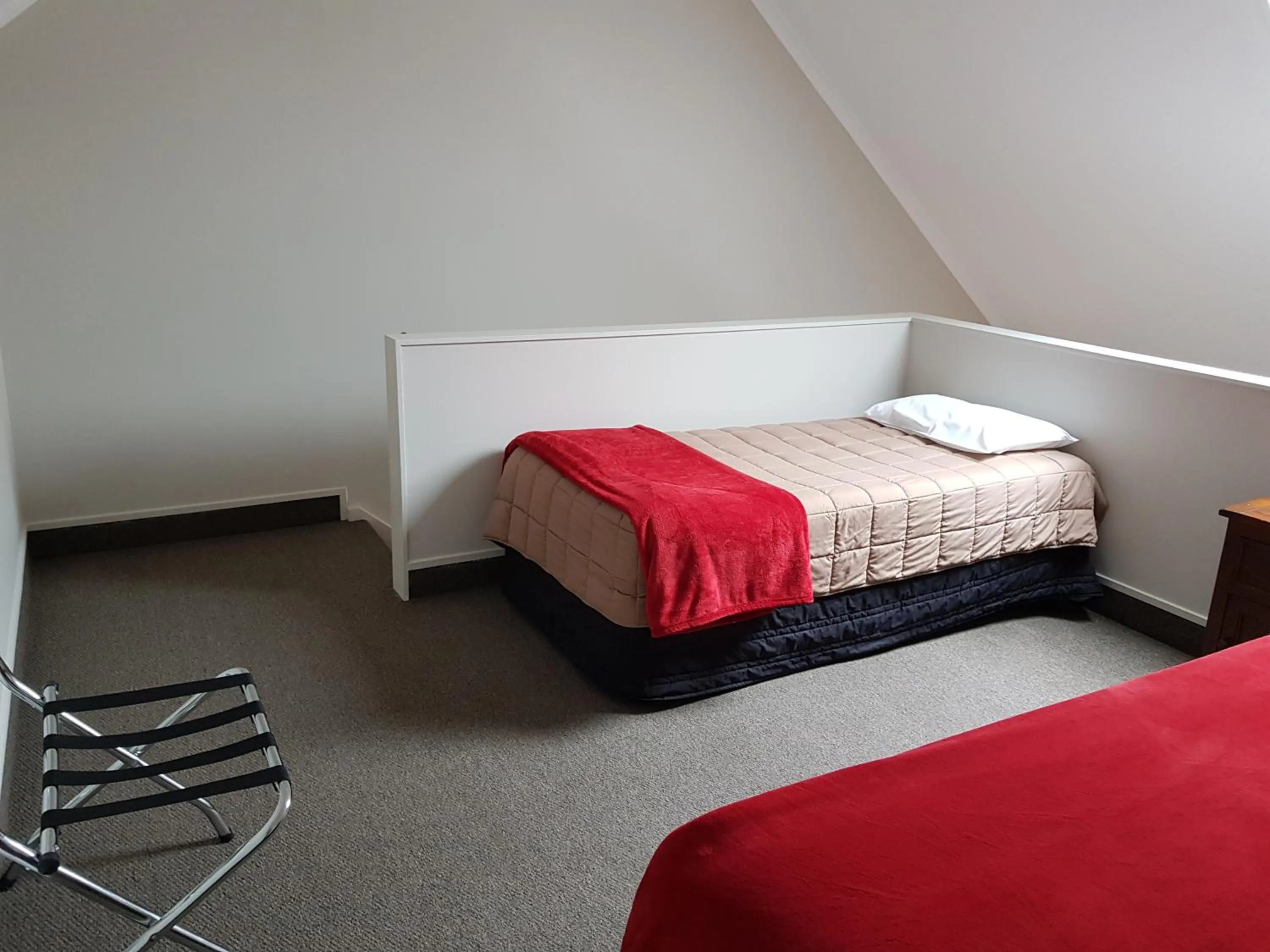 Bed in Bay Palm Motel